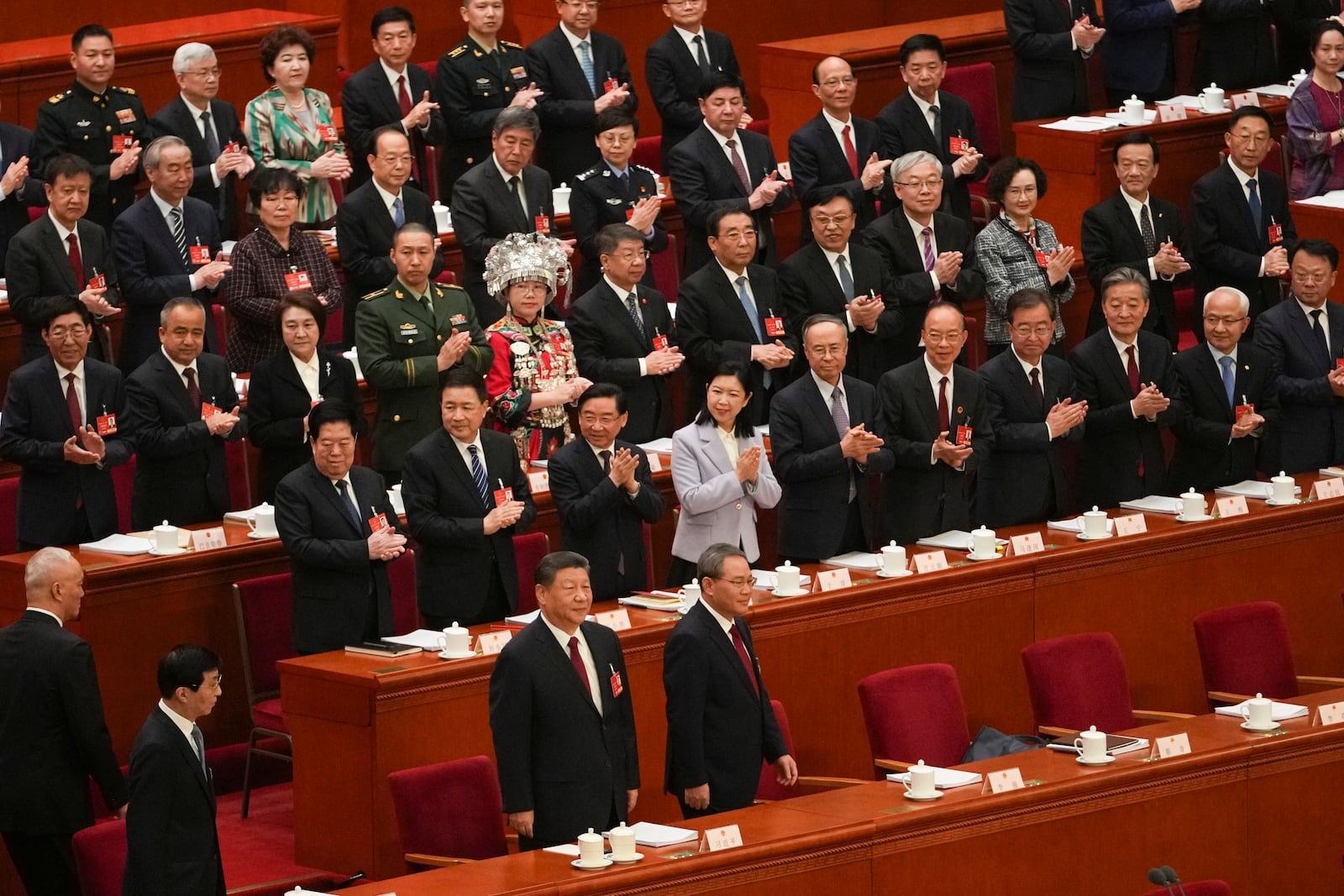 Chinese President Xi Jinping and Chinese Premier Li Qiang arrive for the opening session of the National People's Congress (NPC) at the Great Hall of the People in Beijing, China, Wednesday, March 5, 2025. (AP Photo/Andy Wong)