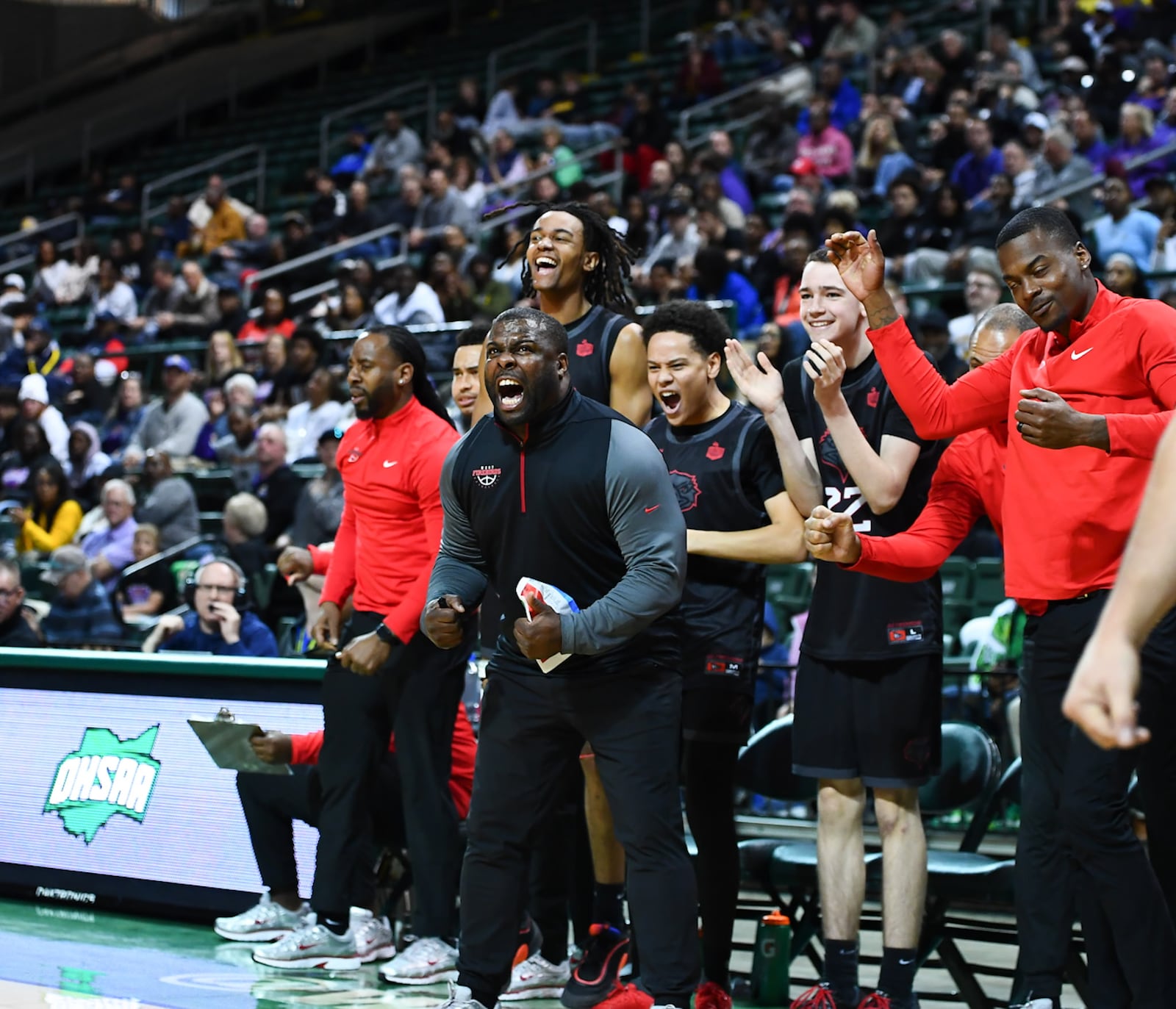 The Lakota West High School celebrates during their game against Reynoldsburg on Sunday afternoon at the Wright State University Ervin J. Nutter Center. KYLE HENDRIX/CONTRIBUTED