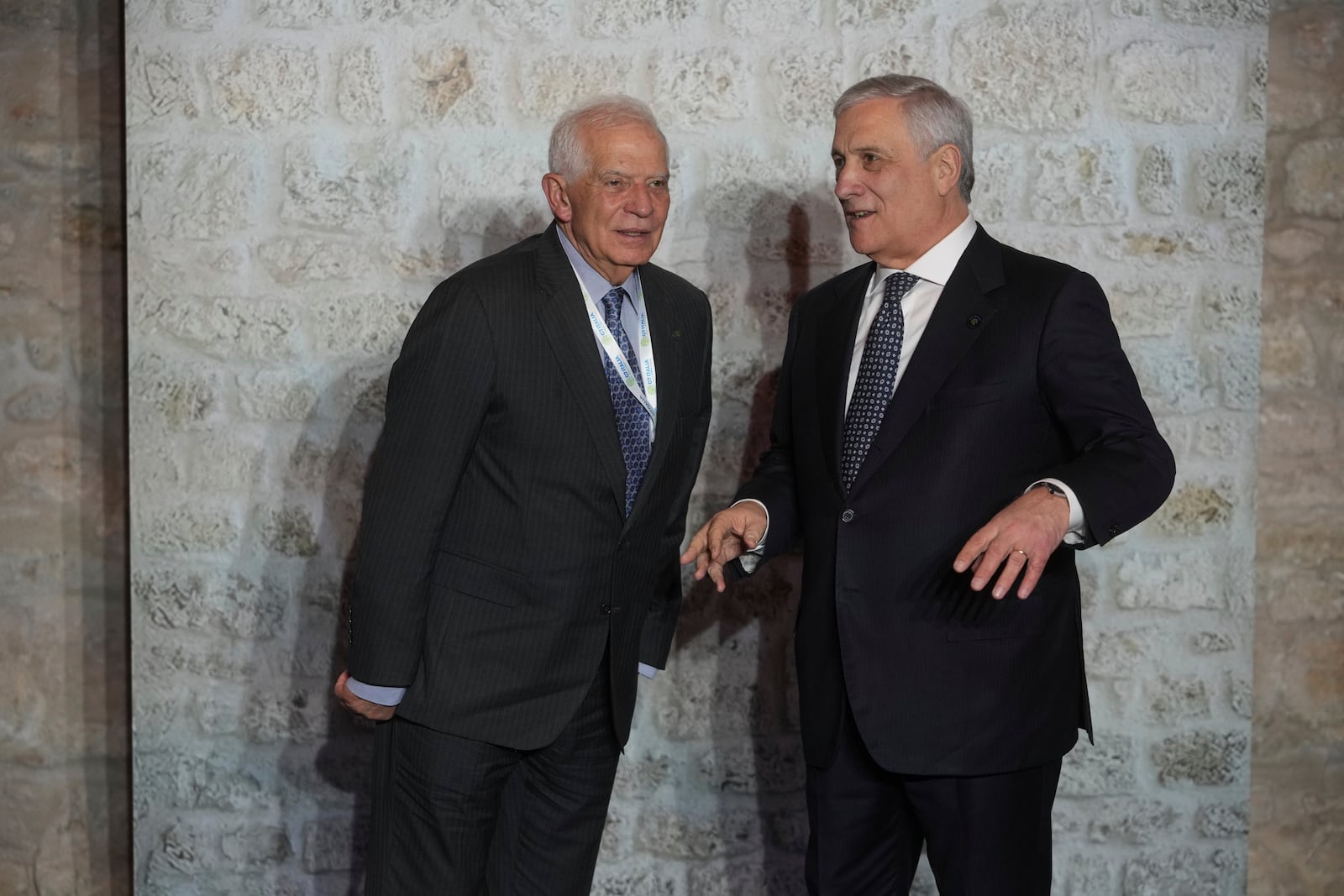 Italian Foreign Minister Antonio Tajani, right, and and European Union foreign policy chief Josep Borrell prepare for a family photo at the G7 of foreign Ministers in Anagni, some 70 kilometers south-east of Rome, Monday, Nov. 25, 2024. (AP Photo/Alessandra Tarantino)