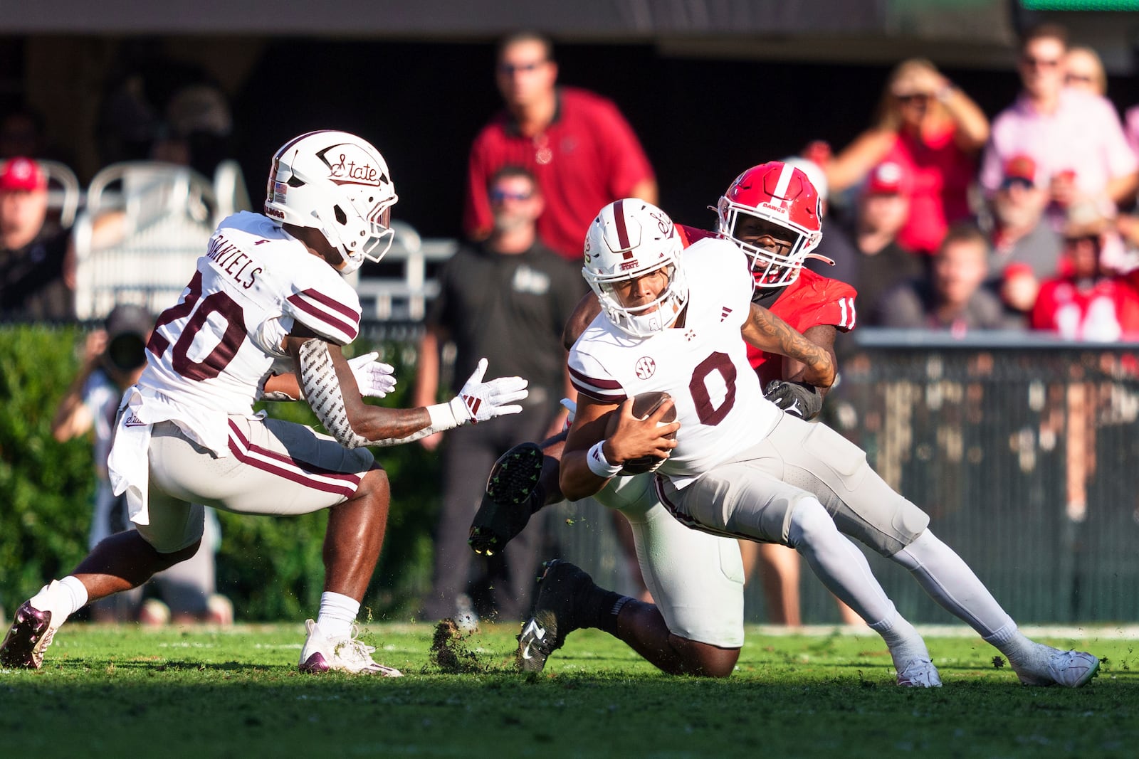 Mississippi State quarterback Michael Van Buren Jr. (0) is tackled by Georgia linebacker Jalon Walker (11) during an NCAA college football game, Saturday, Oct. 12, 2024, in Athens, Ga. (AP Photo/Jason Allen)