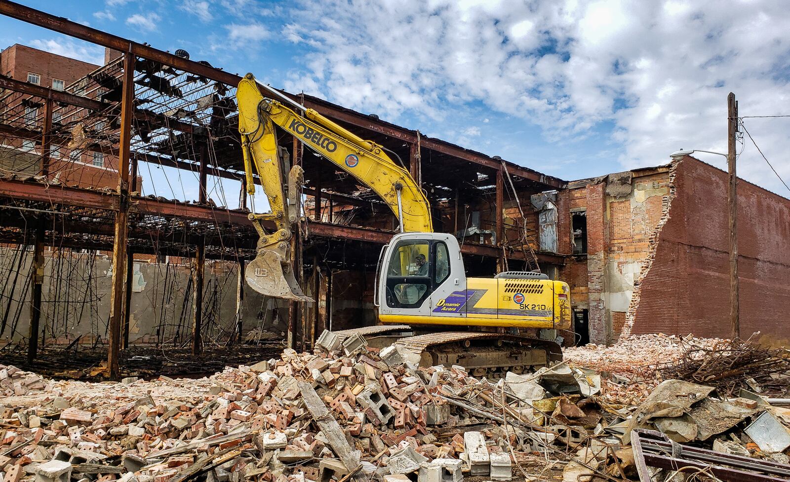 Demolition continues Wednesday, March 13, 2019 on the old Montgomery Ward building on North Main Street in Middletown. Bricks started to fall on the sidewalk from the wall facing North Main Street a few weeks ago so demolition work started ahead of schedule. NICK GRAHAM/STAFF