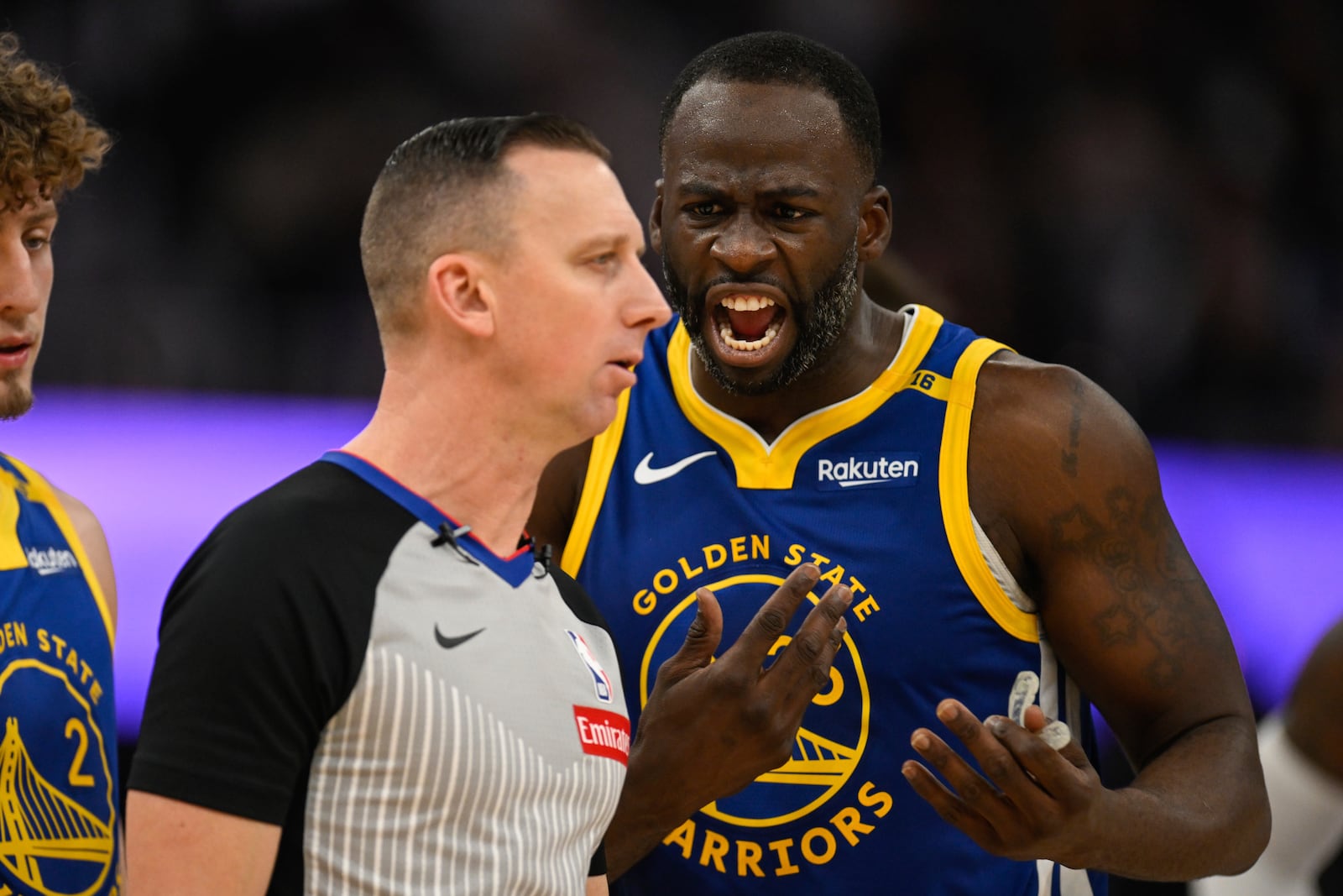 Golden State Warriors forward Draymond Green (23) argues with referee Justin Van Duyne (64) during the first half of an NBA basketball game against the Los Angeles Lakers, Wednesday, Dec. 25, 2024, in San Francisco. (AP Photo/Eakin Howard)