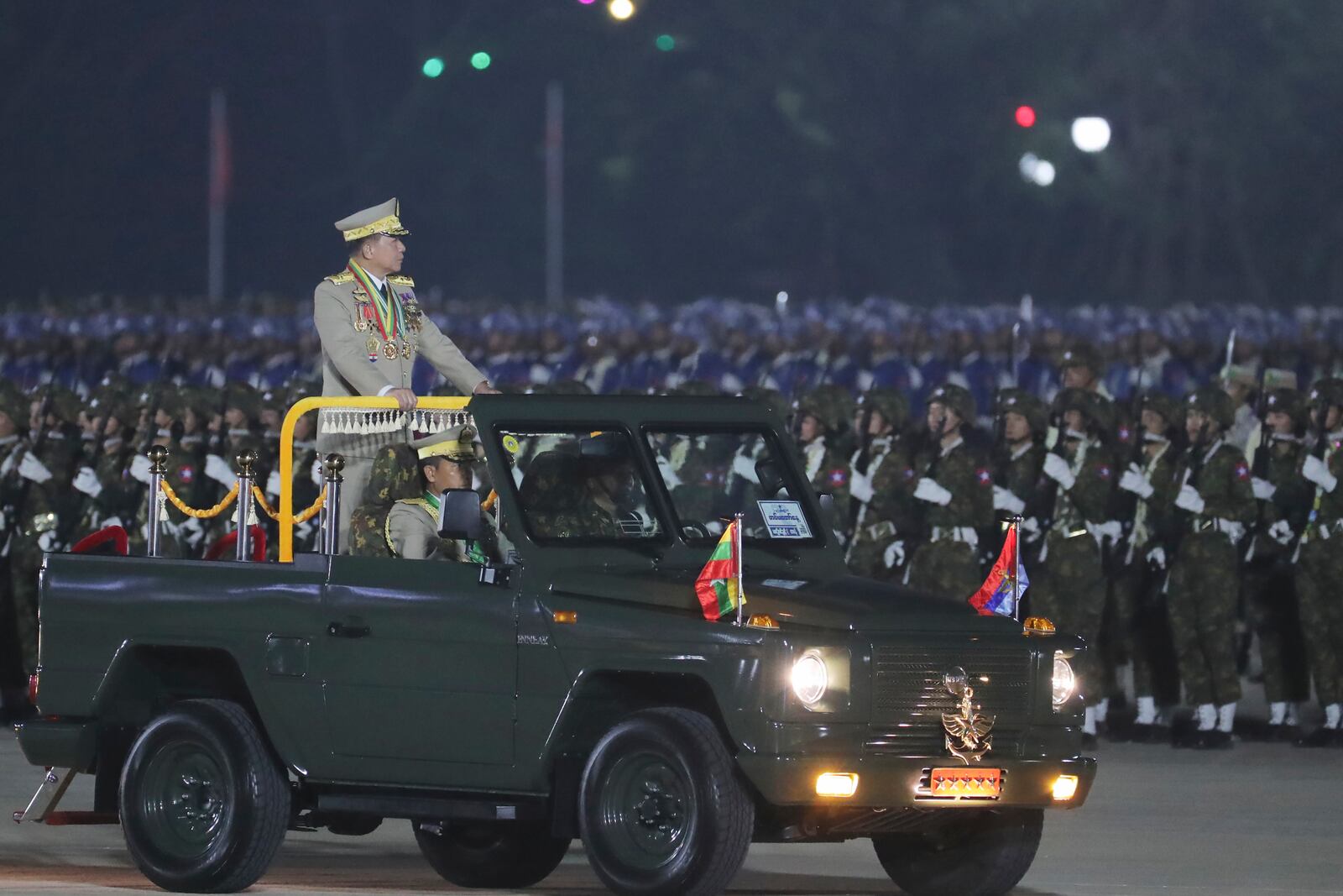 FILE - Myanmar military leader Senior Gen. Min Aung Hlaing, head of the military council, inspects officers during a parade to commemorate Myanmar's 79th Armed Forces Day, in Naypyitaw, Myanmar, on March 27, 2024. (AP Photo/Aung Shine Oo)