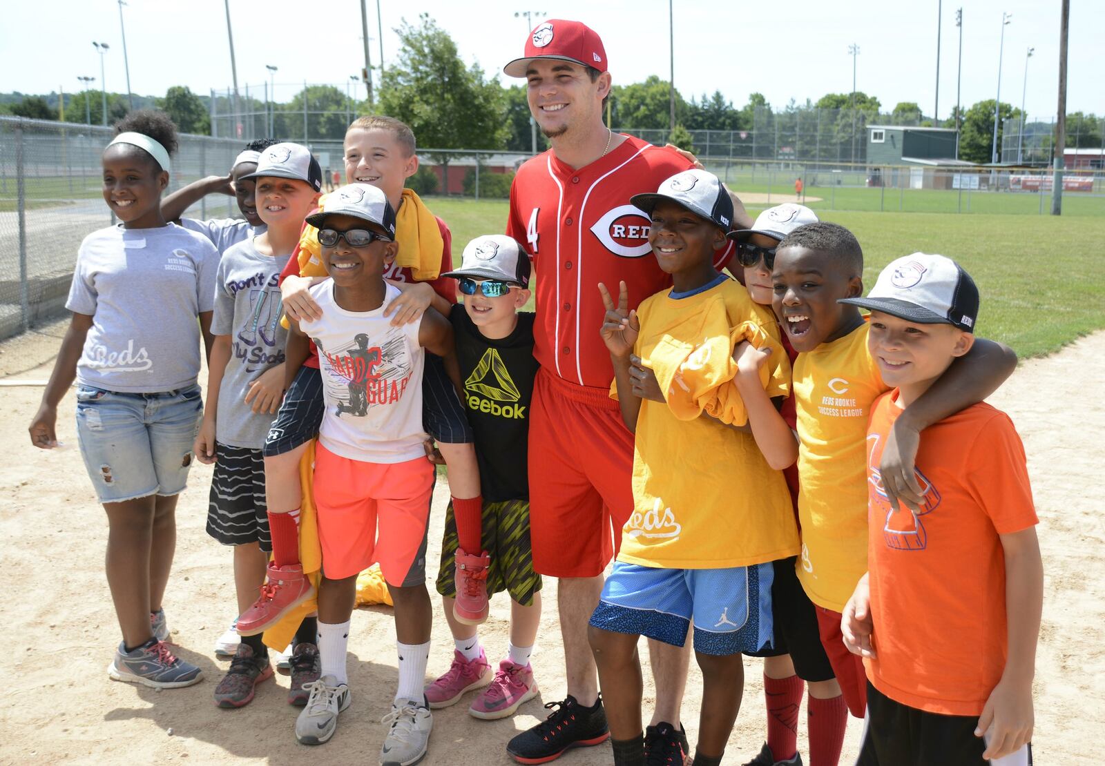 The Butler County Reds Rookie Success League, hosted annually in Fairfield, wrapped the final day of its 11th season with a visit from Cincinnati Reds player Scooter Gennett. MICHAEL D. PITMAN/STAFF