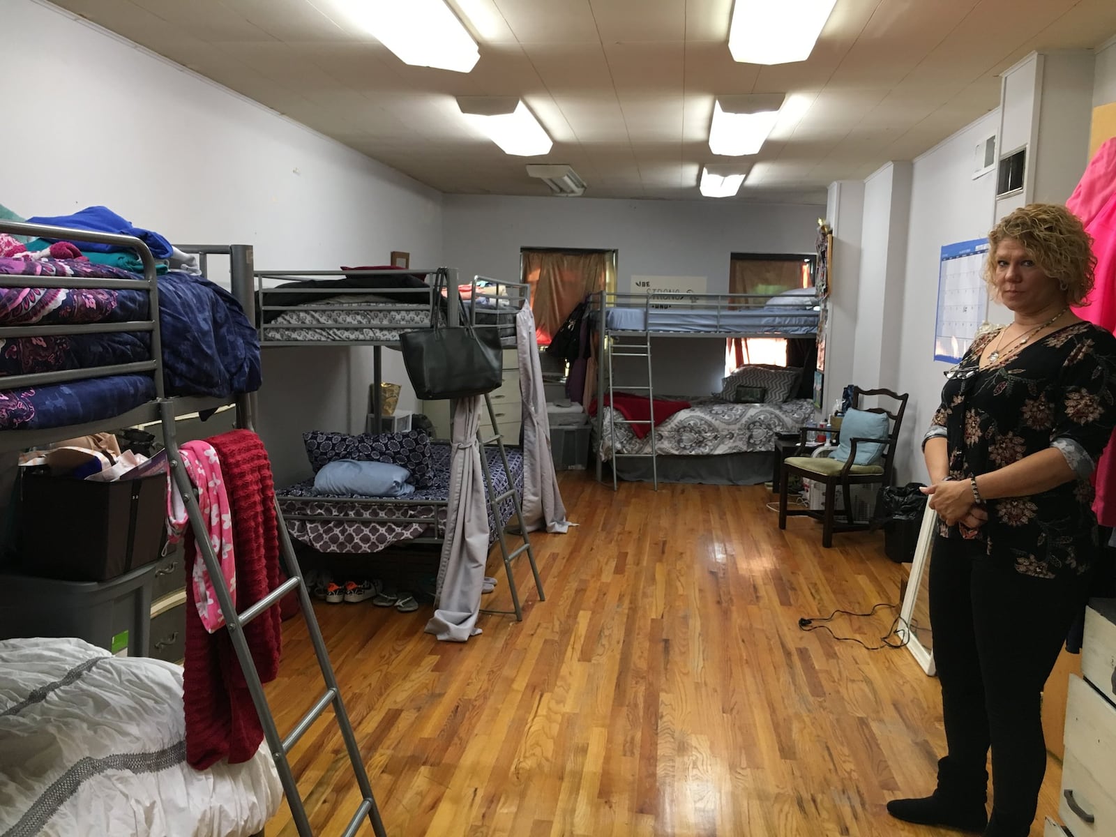 Shauna Snyder in one of the dorm-style living areas of Juliette's Hope, in Lockland. MIKE RUTLEDGE/STAFF