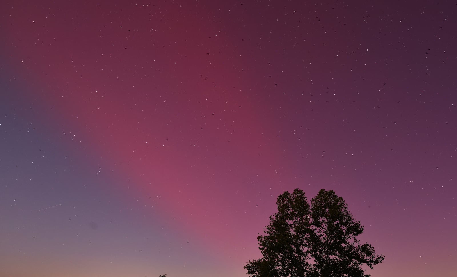 The Aurora Borealis, or northern lights, was visible from Ohio Thursday, Oct. 10, 2024. This was in Madison Township in Butler County. NICK GRAHAM/STAFF