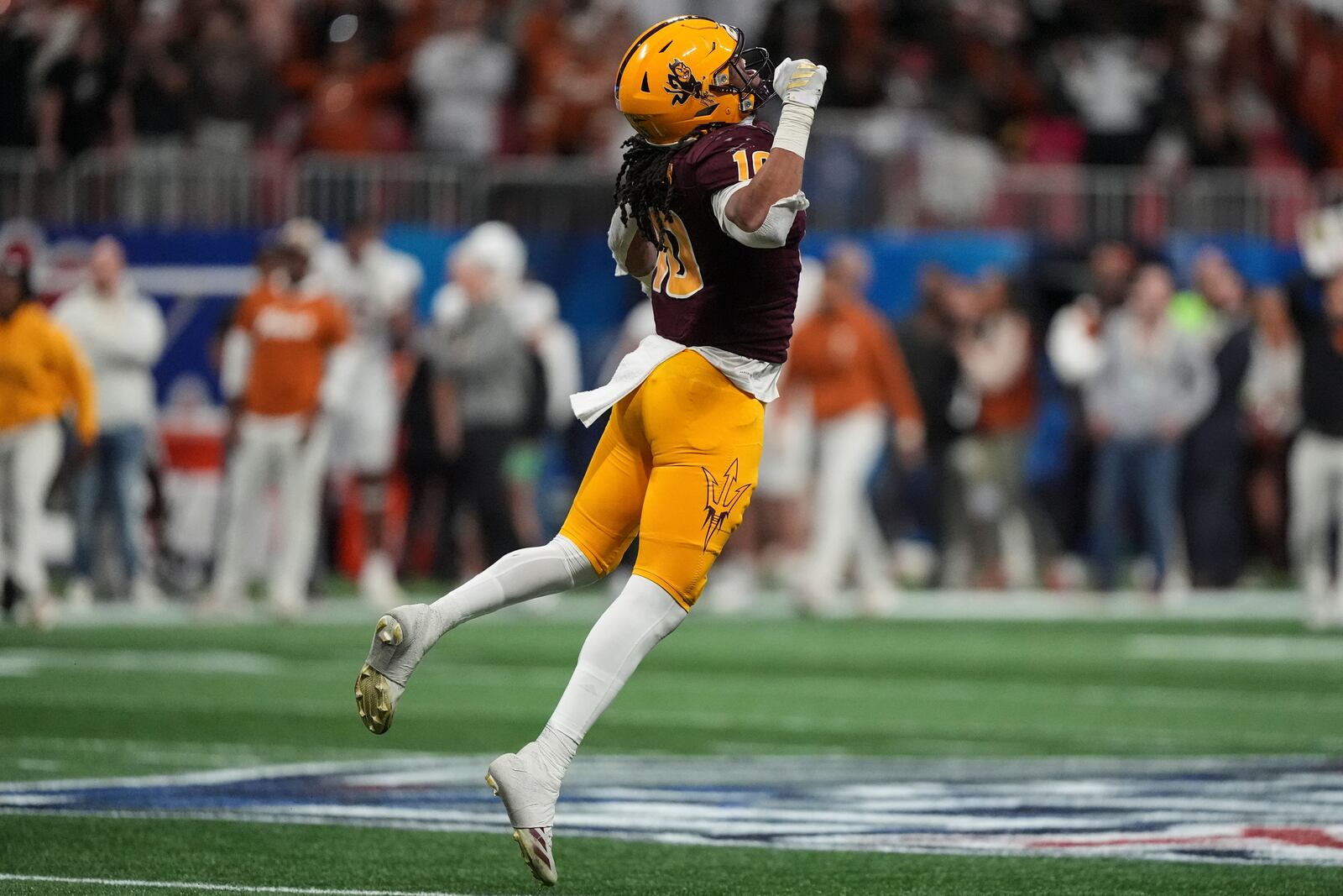 Arizona State defensive lineman Clayton Smith (10) celebrates the missed field goal attempt by Texas during the second half in the quarterfinals of a College Football Playoff game, Wednesday, Jan. 1, 2025, in Atlanta. (AP Photo/Brynn Anderson)