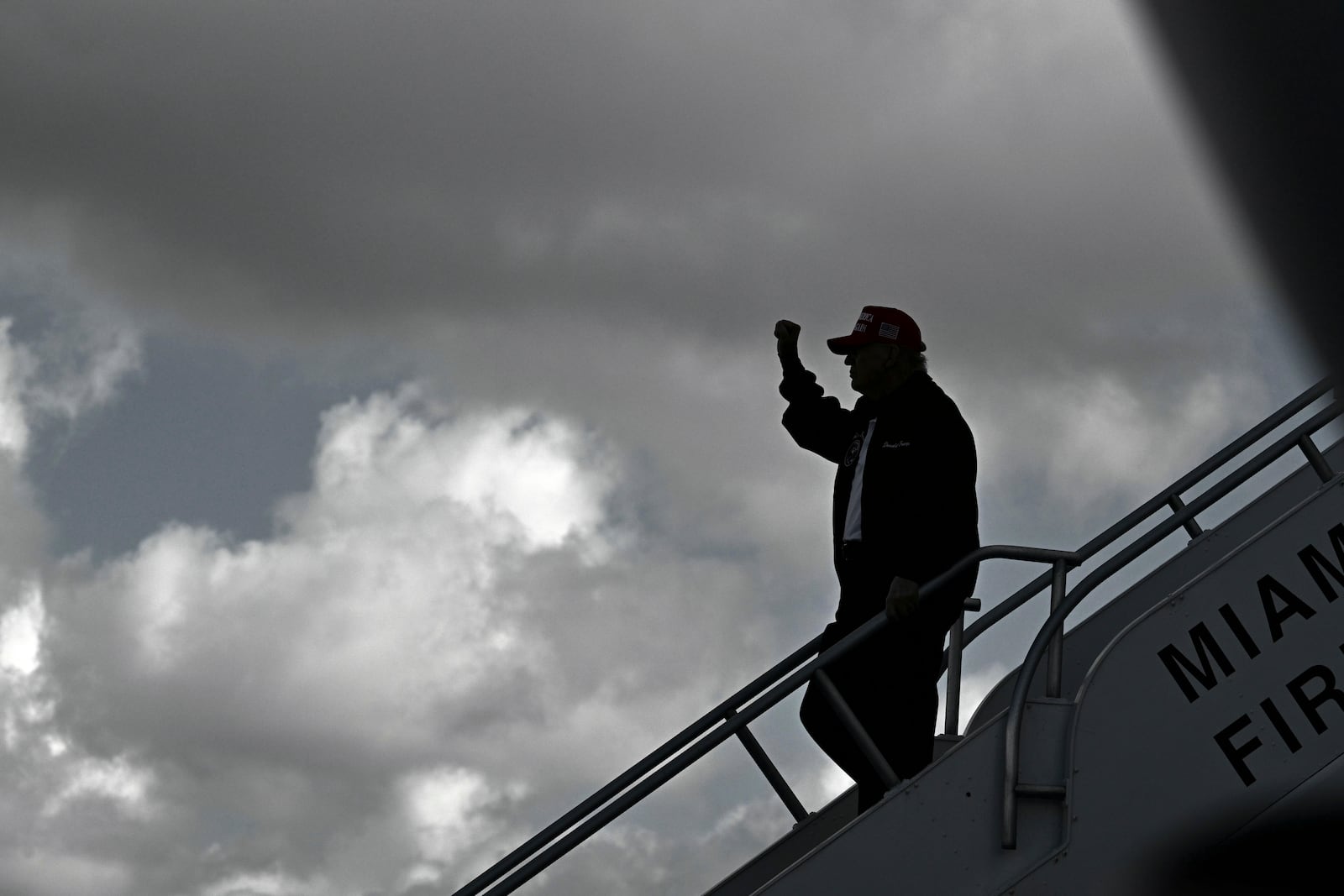 President Donald Trump steps off Air Force One upon arrival at Miami International Airport, Wednesday, Feb. 19, 2025, in Miami. (Photo image via AP)