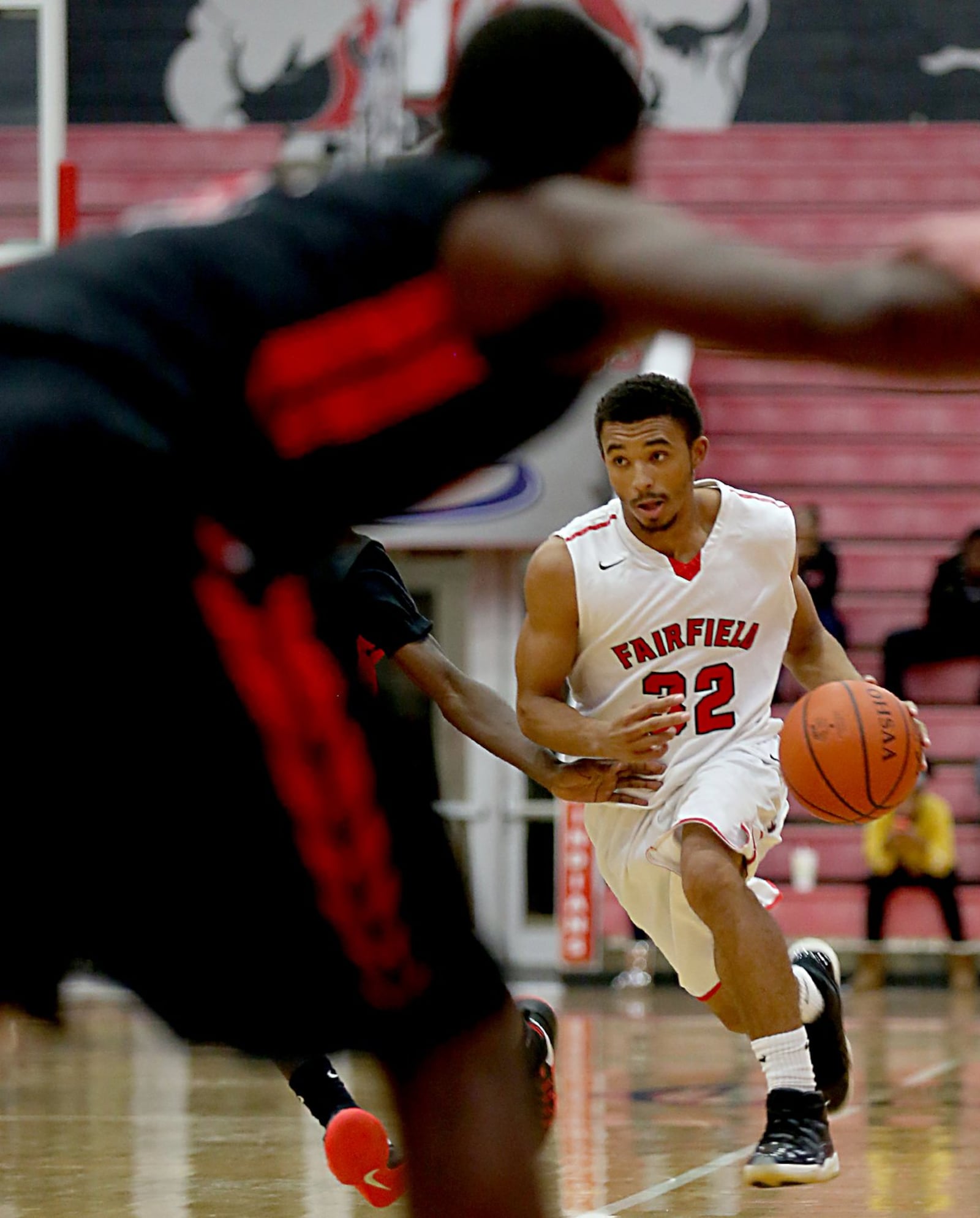 Fairfield guard Aiden Jones brings the ball up the court during Tuesday night’s game against Colerain at Fairfield Arena. CONTRIBUTED PHOTO BY E.L. HUBBARD