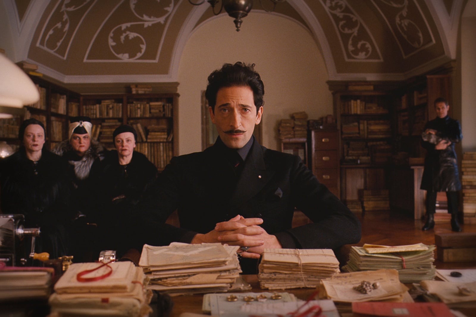 This image released by Criterion shows Adrien Brody in a scene from the 2014 film "The Grand Budapest Hotel." (Criterion via AP)