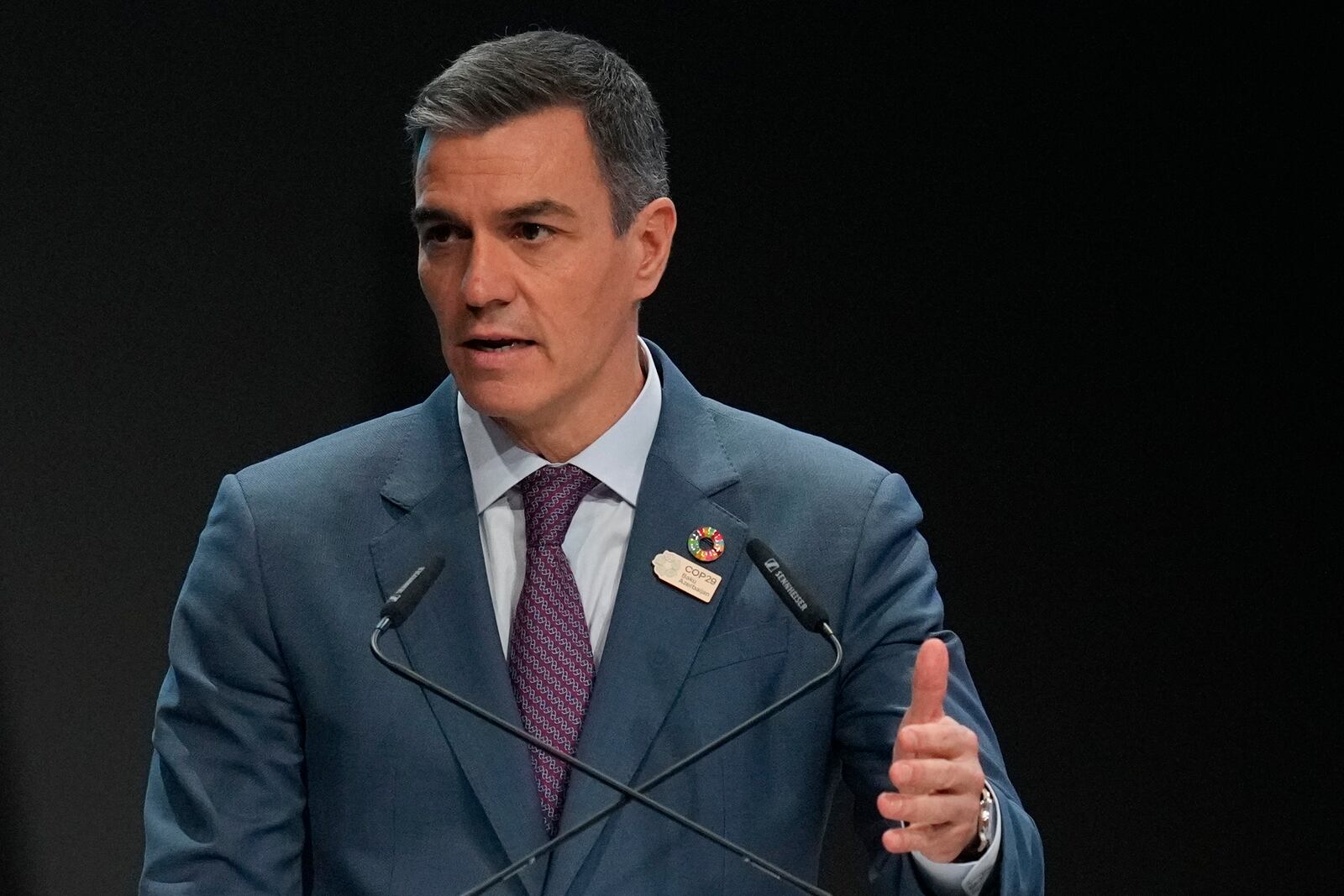 Spain President Pedro Sanchez speaks during a plenary session during a plenary session at the COP29 U.N. Climate Summit, Tuesday, Nov. 12, 2024, in Baku, Azerbaijan. (AP Photo/Rafiq Maqbool)