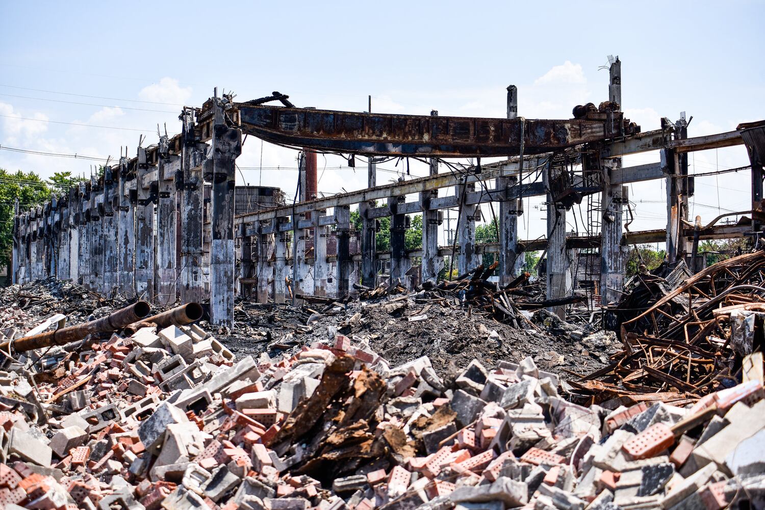 Crews demolish warehouse after massive fire in Hamilton