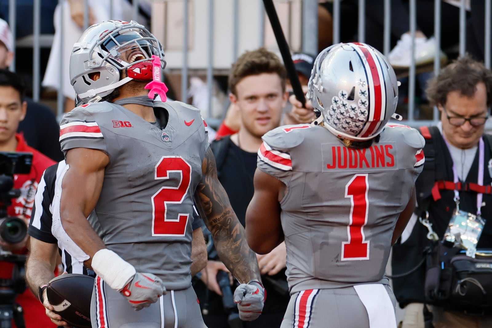 Ohio State receiver Emeka Egbuka, left, and running back Quinshon Judkins celebrate their touchdown against Iowa during the second half of an NCAA college football game, Saturday, Oct. 5, 2024, in Columbus, Ohio. (AP Photo/Jay LaPrete)