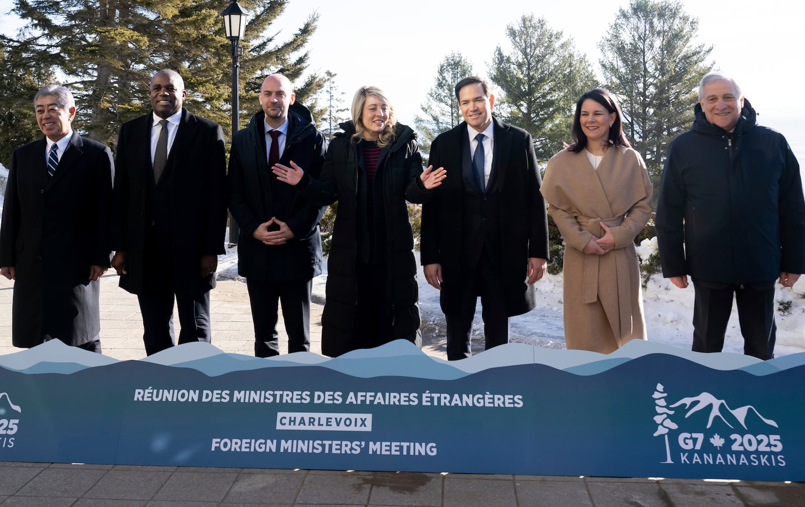 From L to R, Japanese Foreign Minister Takeshi Iwaya, British Foreign Minister David Lammy, French Foreign Minister Jean-Noel Barrot, Canadian Foreign Minister Melanie Joly, U.S. Secretary of State Marco Rubio, German Foreign Minister Annalena Baerbock and Italian Foreign Minister Antonio Tajani pose for the family photo during the G7 foreign ministers meeting in La Malbaie, Quebec, on March 13, 2025. (Saul Loeb/Pool via AP)