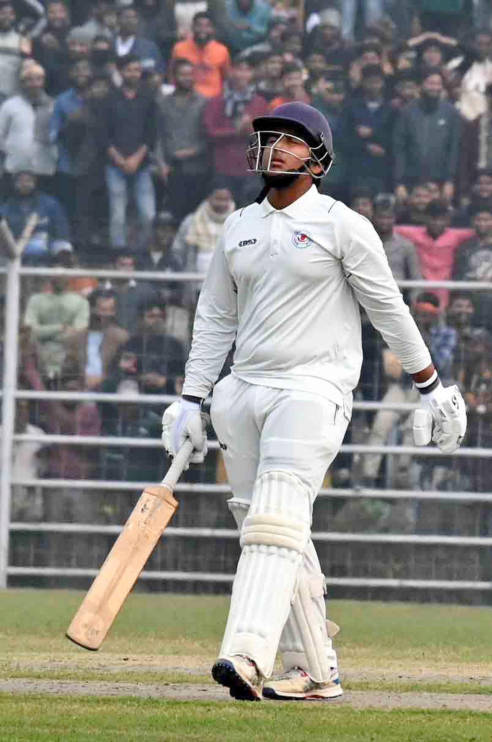 Vaibhav Suryavanshi, one the the youngest Indian cricket player to earn an Indian Premier League contract after Rajasthan Royals (RR) signed for approximately Indian rupees 1.10 crore or USD $ 130481, walks to bat during local Ranji Trophy cricket league, in Patna, India, Saturday, Jan. 6, 2024. (AP Photo/ After Alam)