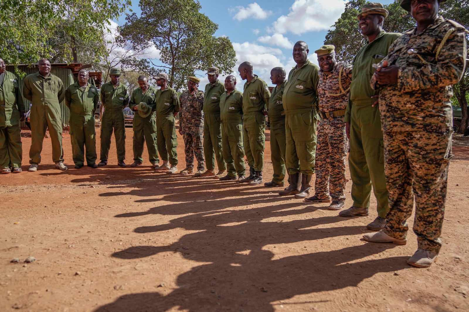 Kenya Wildlife Service rangers and capture team hold a briefing at Mwea National Park, east of the capital Nairobi, Kenya Monday, Oct. 14, 2024. (AP Photo/Brian Inganga)