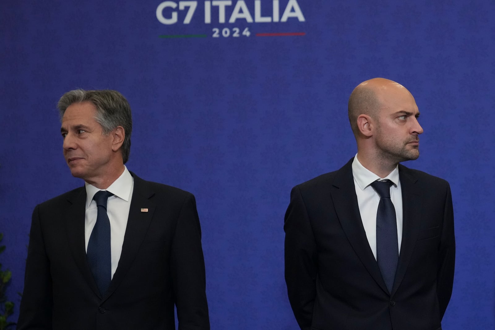 U.S. Secretary of State Antony Blinken, left, and foreign Ministers of France, Jean-Noël Barrot, wait for the family photo at the G7 of foreign Ministers in Fiuggi, some 70 kilometers south-east of Rome, Tuesday, Nov. 26, 2024. (AP Photo/Alessandra Tarantino, Pool)