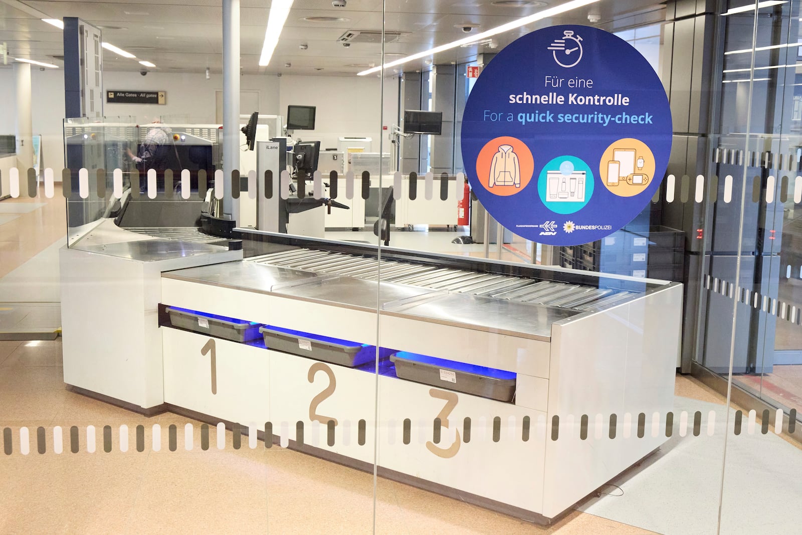 Security checkpoints are empty at Hamburg Airport, Germany Sunday, March 9, 2025. Georg Wendt/dpa via AP)