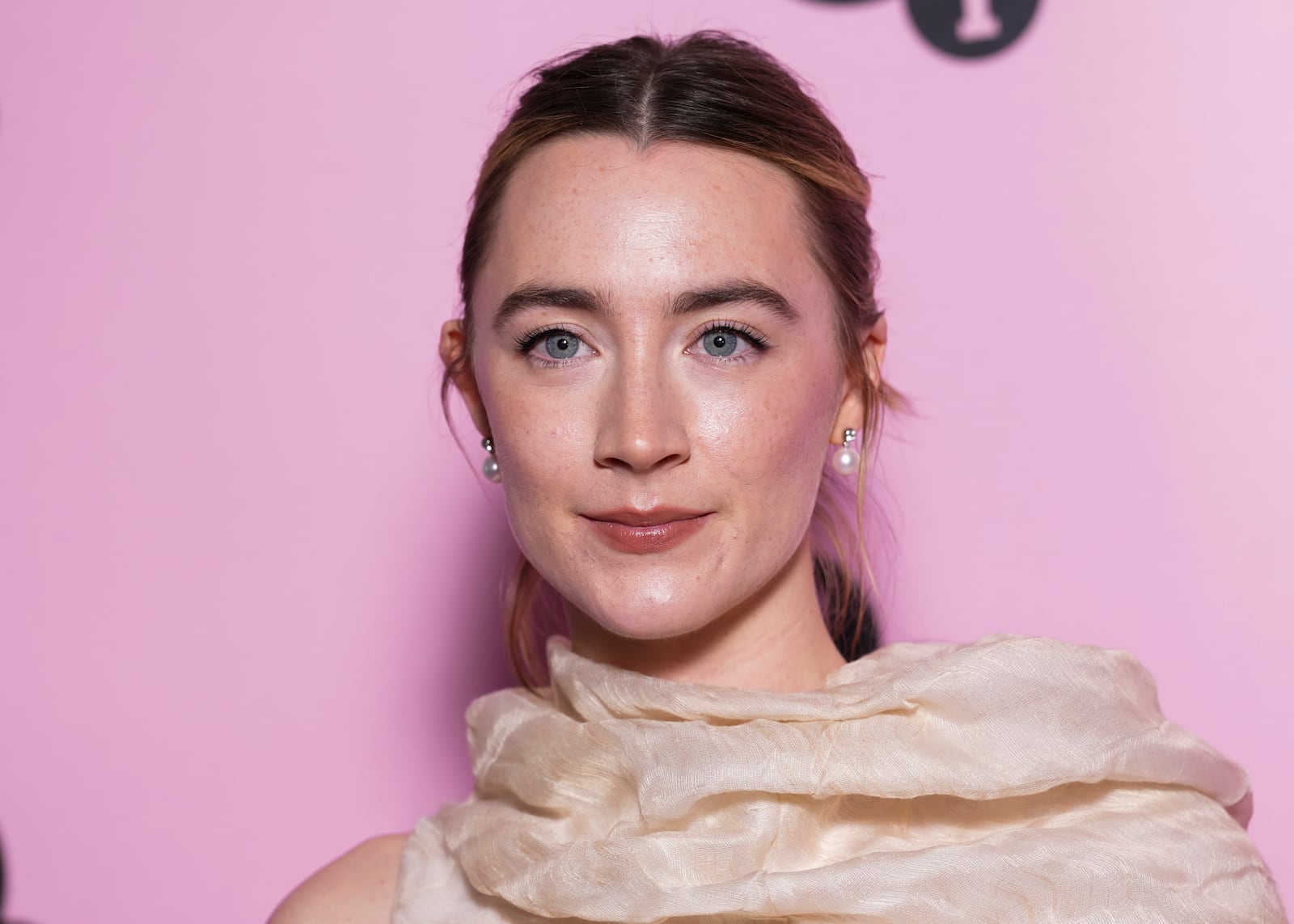 Saoirse Ronan poses for photographers upon arrival at the photo call for an 'In Conversation' event at the BFI Southbank, on Wednesday, Dec. 18, 2024, in London. (Photo by Scott A Garfitt/Invision/AP)