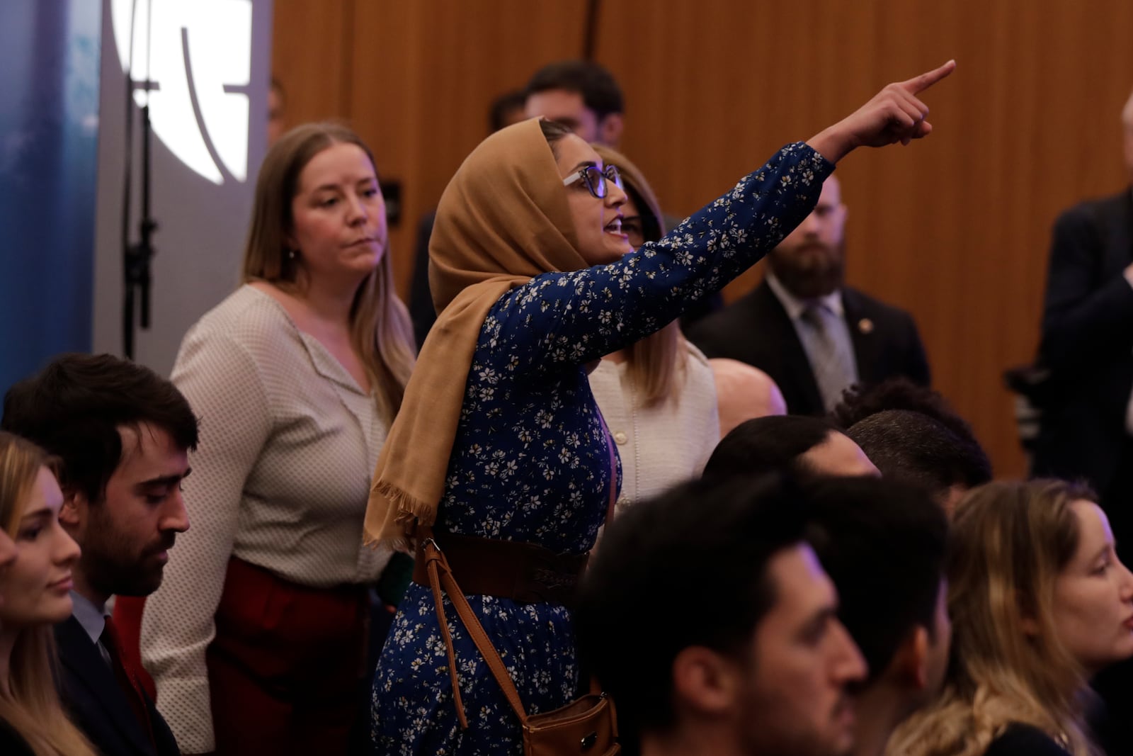 A protestor interrupts Secretary of State Antony Blinken speech at the Atlantic Council, Tuesday, Jan. 14, 2025, in Washington. (AP Photo/Luis M. Alvarez)