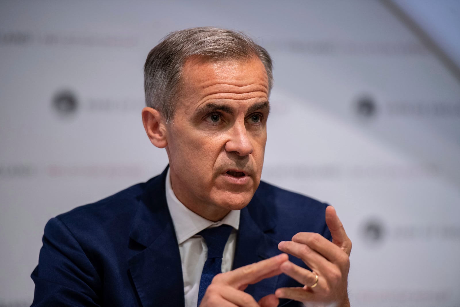 FILE - Governor of the Bank of England, Mark Carney, speaks during the Bank of England interest rate decision and inflation report press conference at the Bank of England in London, Thursday, Aug. 1, 2019. (Chris J Ratcliffe/Pool Photo via AP, File)