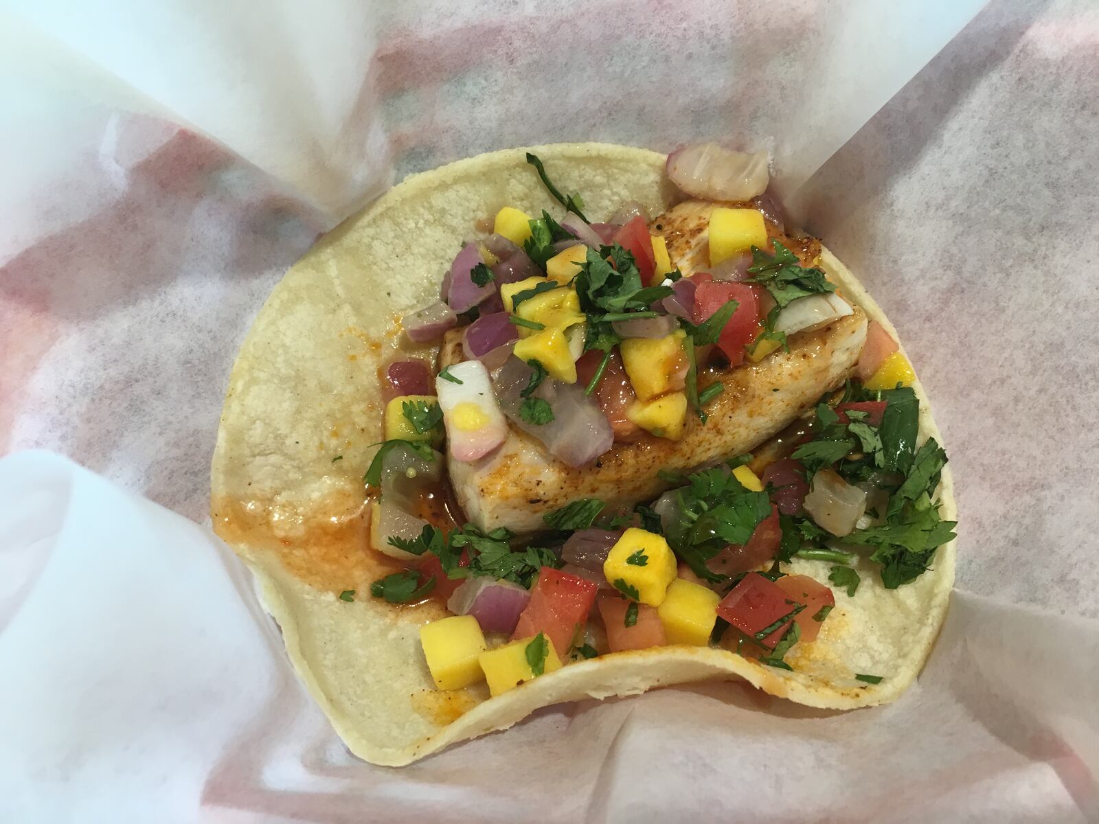 Fuzzy's Taco Shop has a new summer menu that'll inspire you to live your best baja life. With tropical-inspired margaritas, shrimp burrito bowls and mahi mahi tacos topped with mango salsa, you'll be transported to a so-cal state of mind.