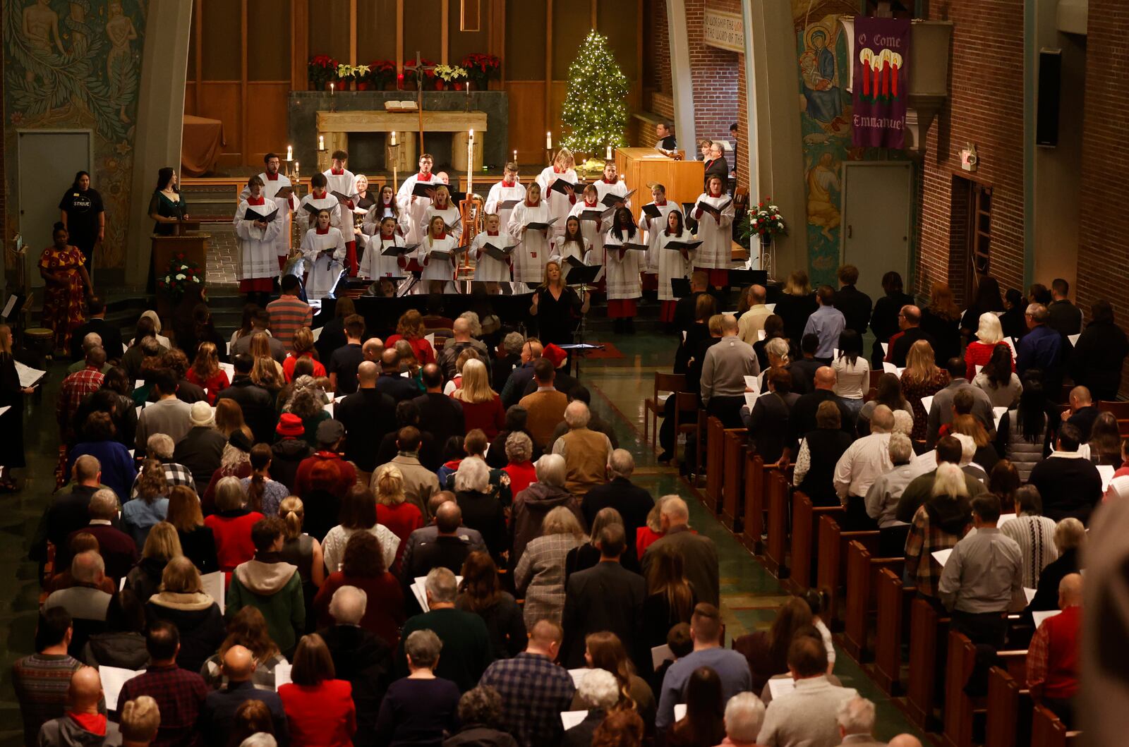 It was a full house for the Lessons and Carols for Advent and Christmas ceremony at Weaver Chapel on the Wittenberg University campus in Springfield Friiday, Dec. 8, 2023. BILL LACKEY/STAFF