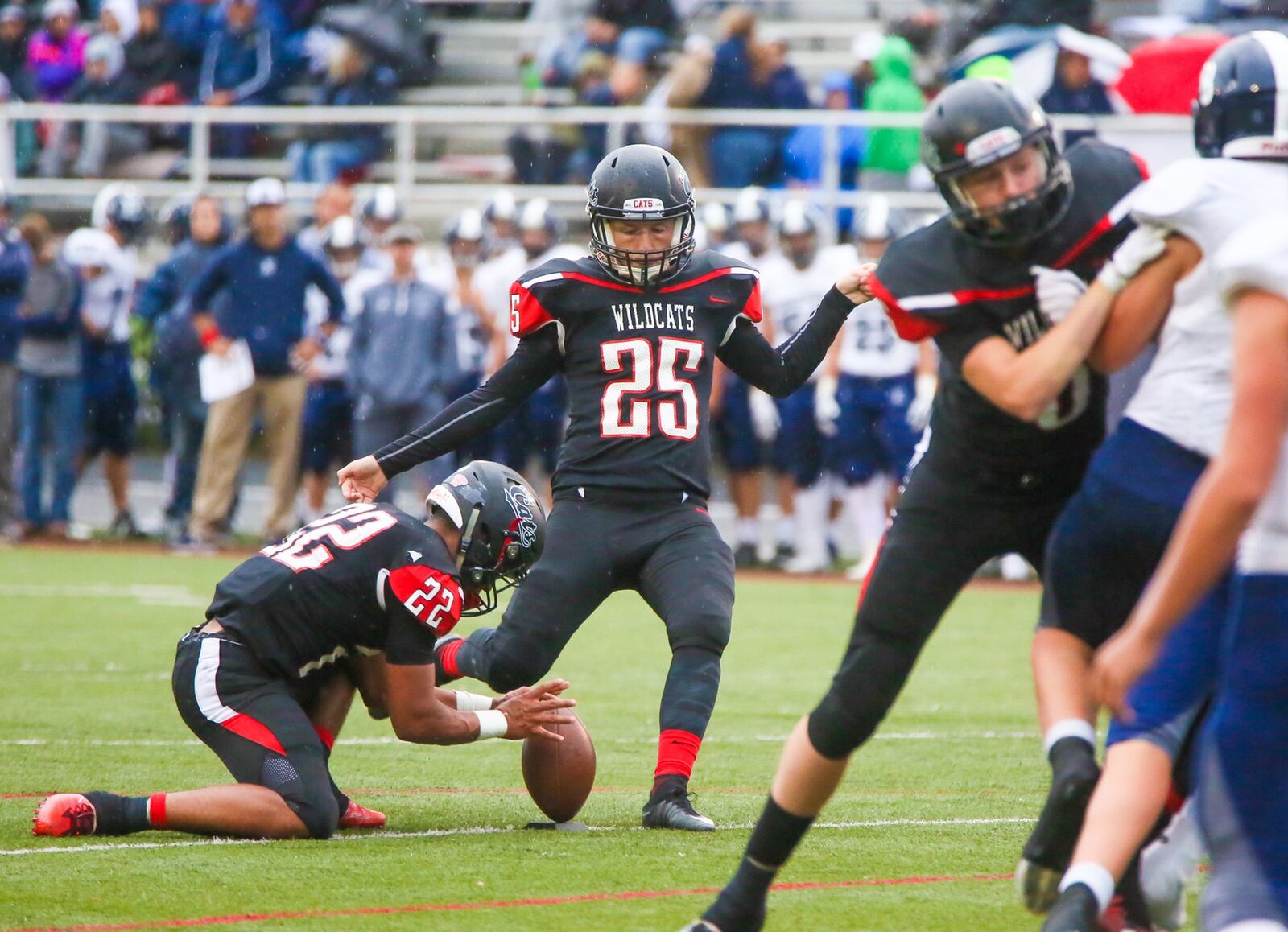 Franklin place-kicker Matt Schneider (25) makes an extra point during a 49-21 win over Edgewood on Sept. 1 at Atrium Stadium in Franklin. GREG LYNCH/STAFF