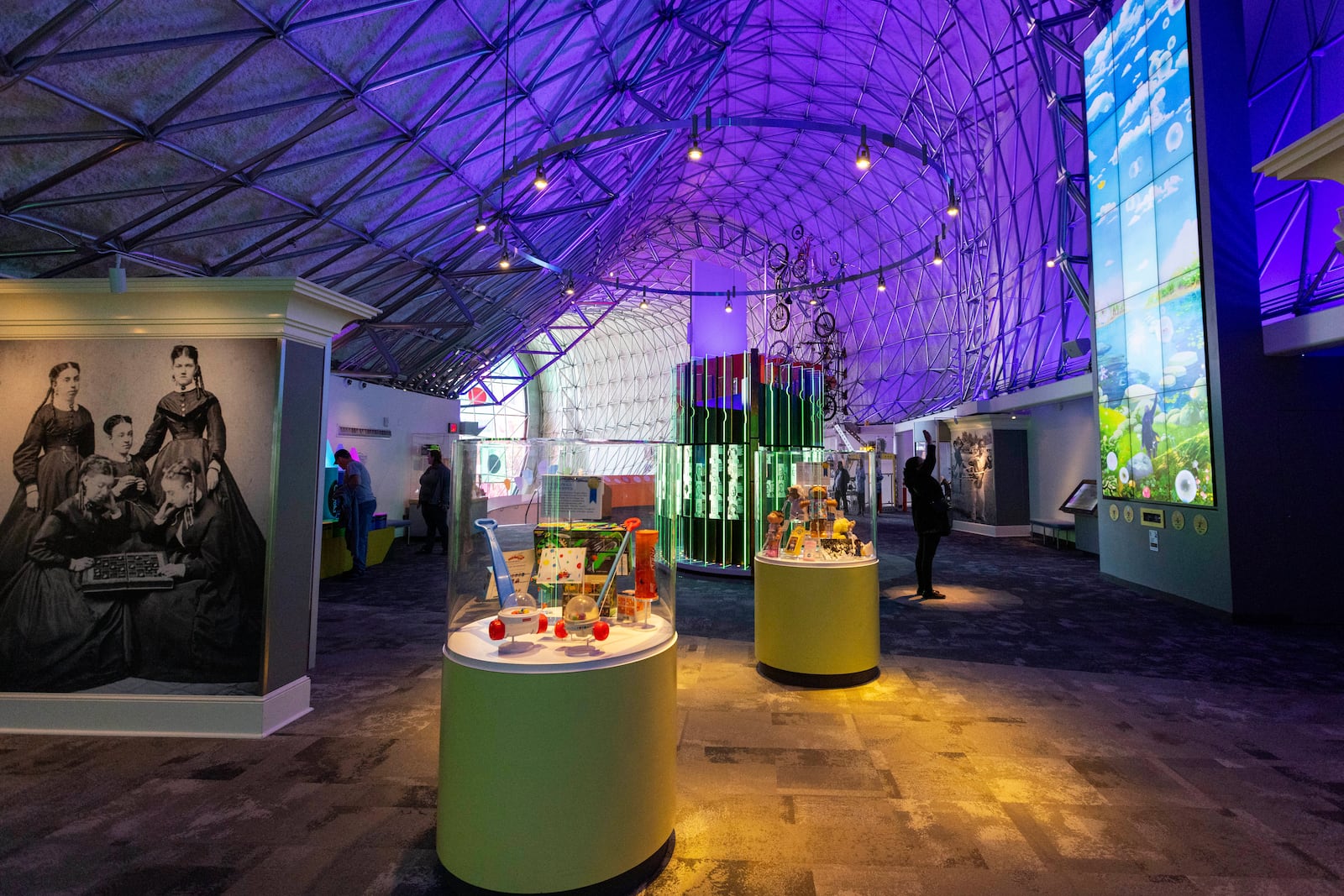 Visitors walk through the Toy Hall of Fame inside The Strong National Museum of Play, Tuesday, Oct. 15, 2024, in Rochester, N.Y. (AP Photo/Lauren Petracca)