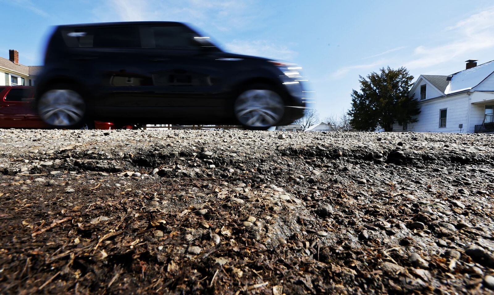 The city of Hamilton is addressing the condition of some of its residential streets with in-house work thanks to new milling and paving machines. The work will supplement the traditional capital road projects and paving projects paid out of the streets levy fund. This summer and fall, city crews will mill and pave streets that don't have low enough Pavement Condition Index scores but need improvement. This section of Cleveland Ave. is one of the several streets that will be targeted by the city's Public Works Department. NICK GRAHAM/FILE