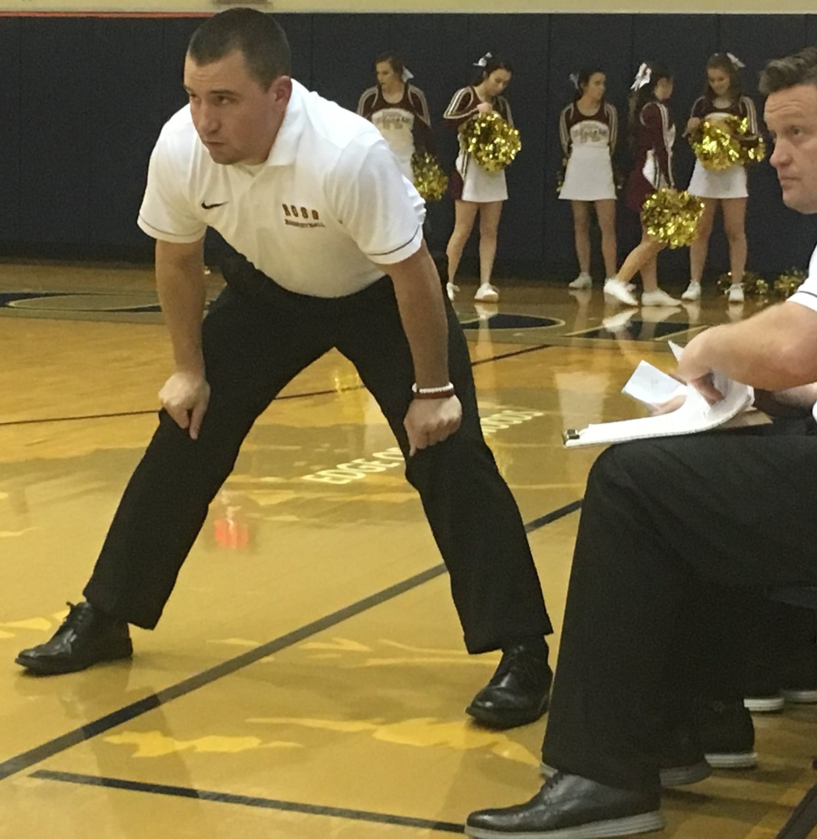 Ross coach David Lane keeps a close eye on the action during his team’s 69-65 overtime victory at Edgewood on Friday night. RICK CASSANO/STAFF