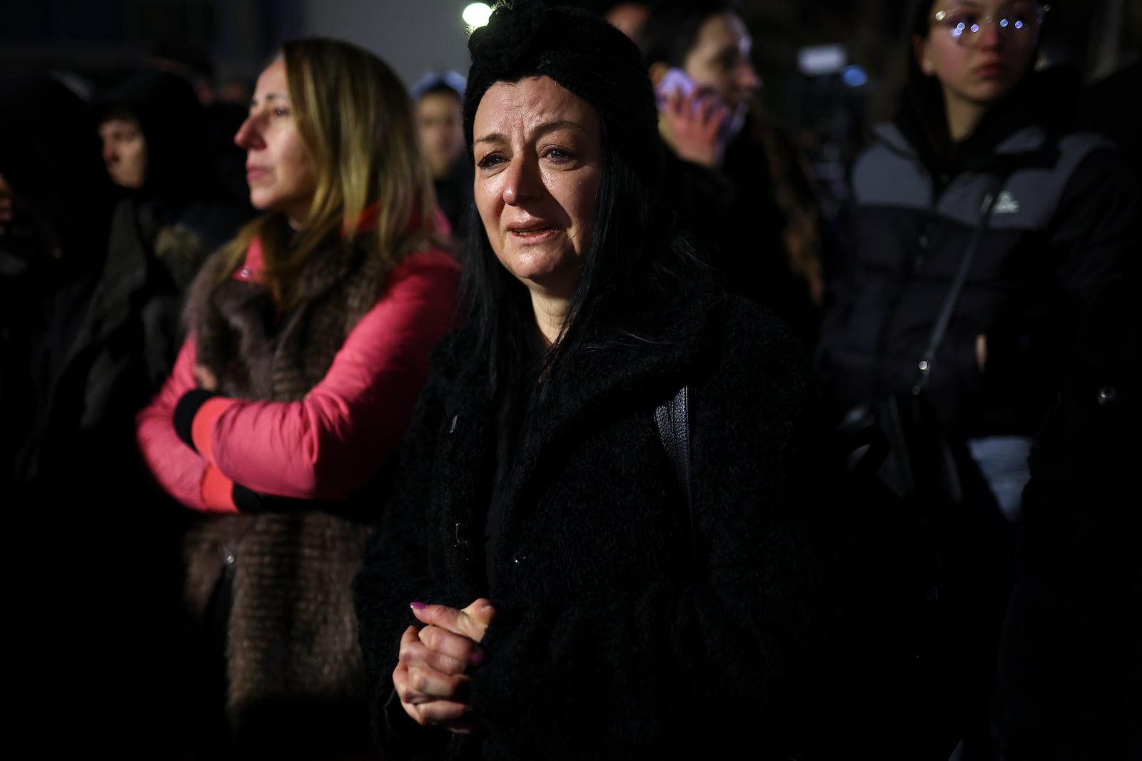 People take part in a protest in the town of Kocani, North Macedonia, Tuesday, March 18, 2025 following a massive fire in a nightclub early SUnday. (AP Photo/Armin Durgut)