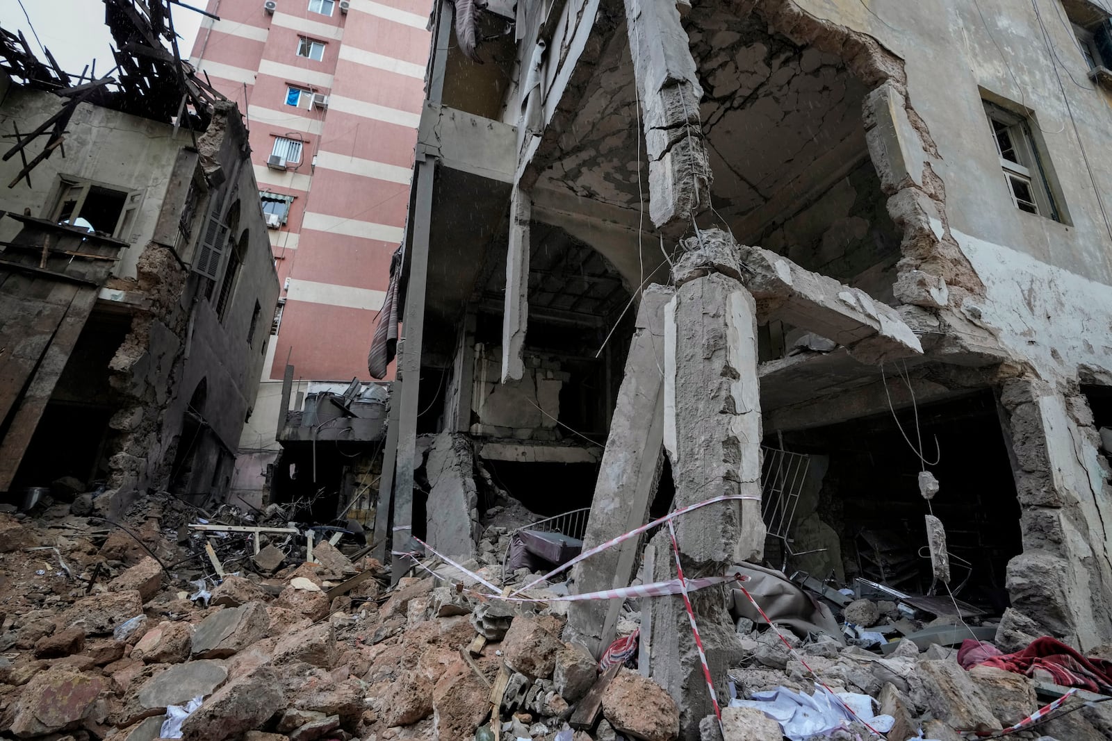 A destroyed building hit on Monday evening by an Israeli airstrike is seen in central Beirut, Lebanon, Tuesday, Nov. 19, 2024. (AP Photo/Bilal Hussein)