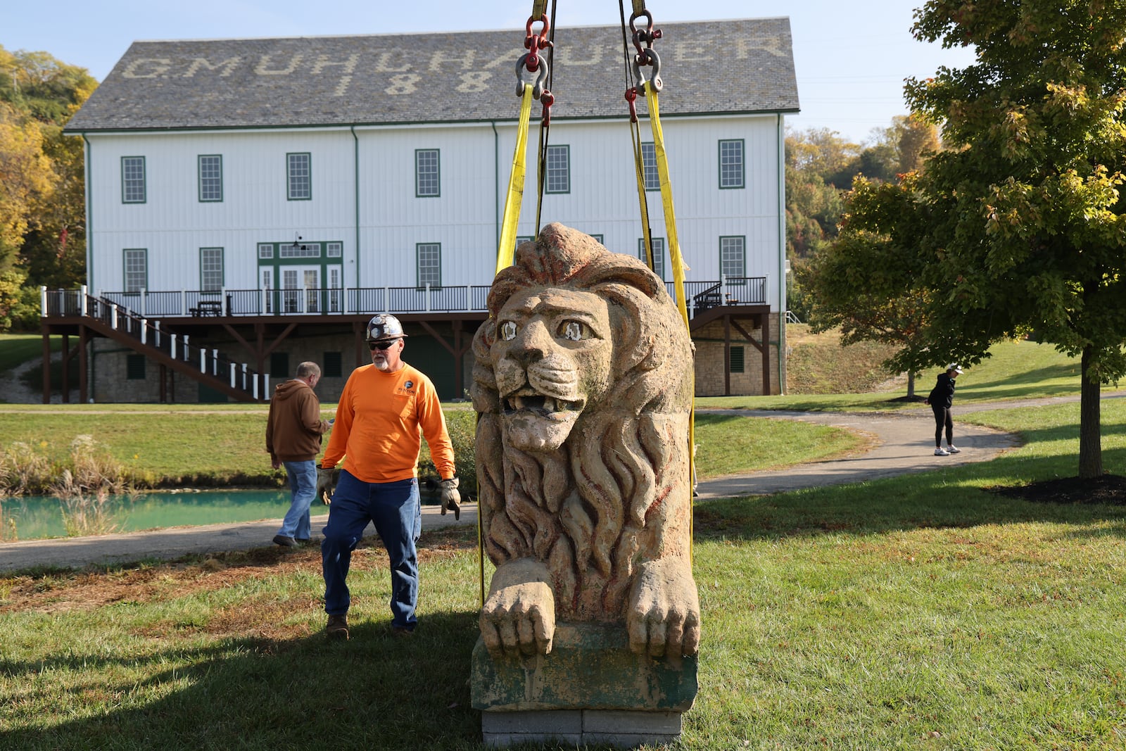 A 10,000-pound lion statue with a legacy from Cincinnati’s storied brewery history has a new home at a local park. The 10-foot long and six-foot high stone lion once adorned the top of a long-closed brewery building but had spent his recent decades on a farm with a family connection to the brewery in Ross Twp. Dubbed “Leo” the lion is now standing guard in West Chester Twp.’s Beckett Park, a lion’s leap or two from the township’s historic Muhlhauser Barn off Beckett Road. CONTRIBUTED/ WEST CHESTER TWP.