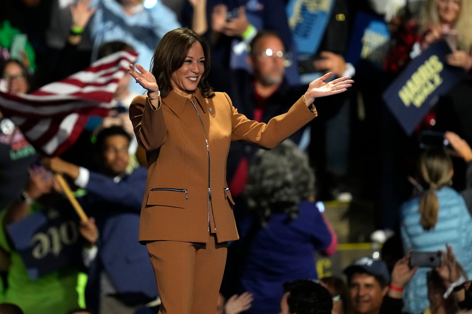 Democratic presidential nominee Vice President Kamala Harris departs after speaking at a campaign rally at the Wings Event Center, Saturday, Oct. 26, 2024, in Kalamazoo, Mich. (AP Photo/Paul Sancya)