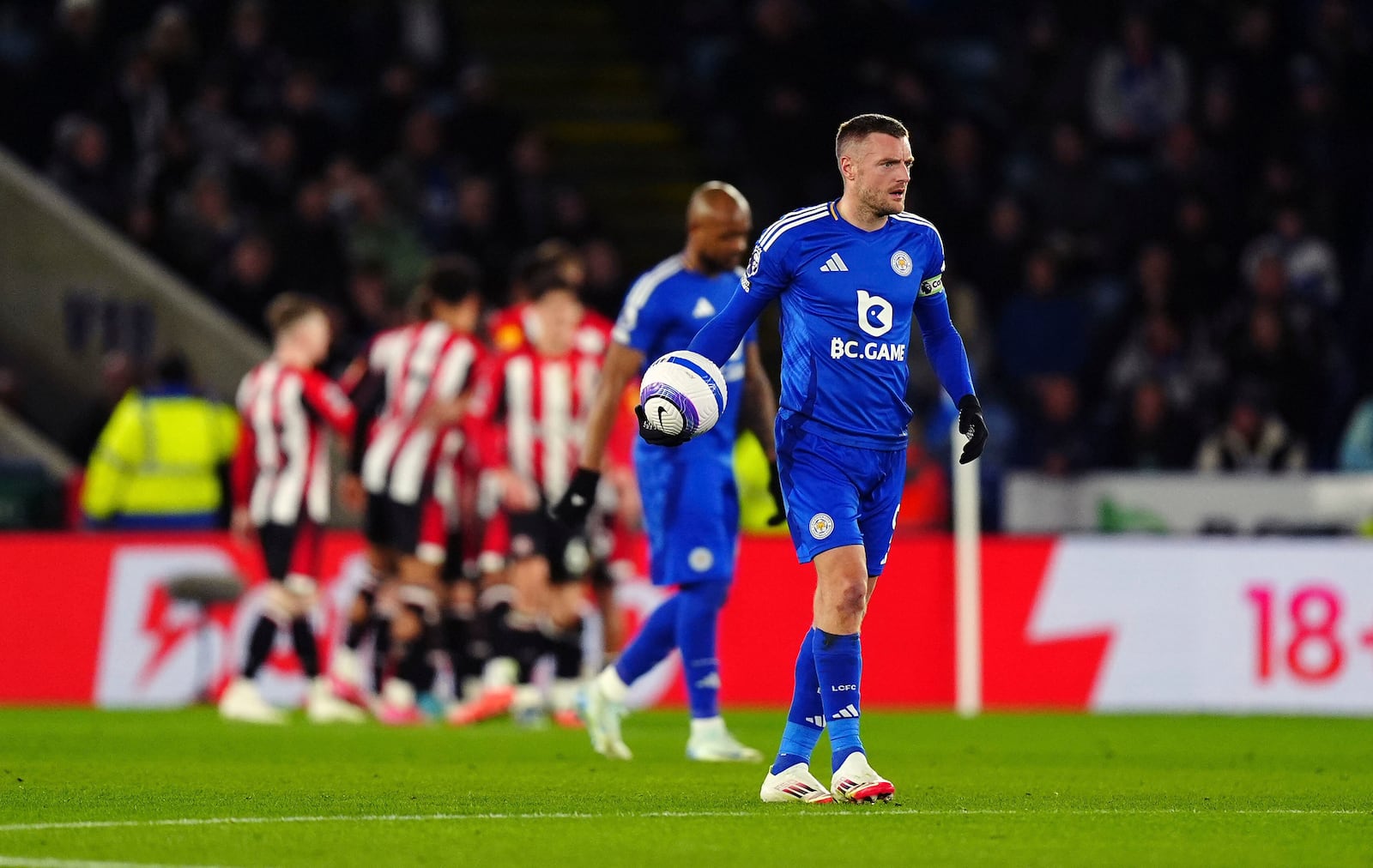 Leicester City's Jamie Vardy reacts after they conceded a second goal to Brentord during the Premier League soccer match at the King Power Stadium in Leicester, England, Friday, Feb. 21, 2025. (Mike Egerton/PA via AP)