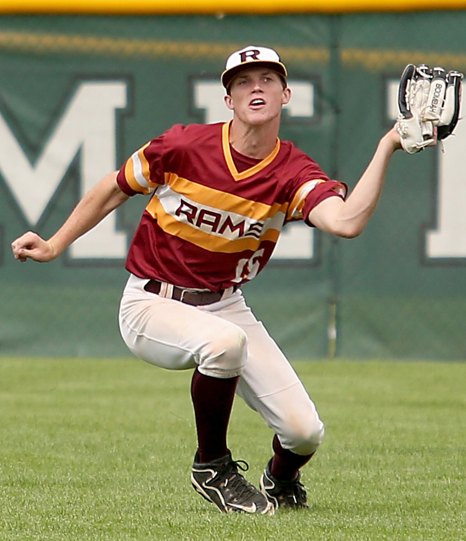 Ross center fielder Joey Wright hauls in a Columbus DeSales fly ball Friday during their Division II regional semifinal at Mason. CONTRIBUTED PHOTO BY E.L. HUBBARD