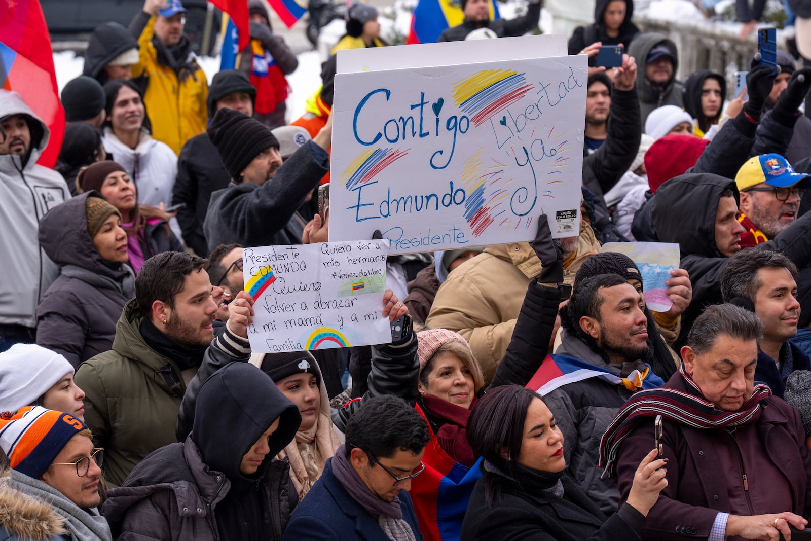 Supporters of Venezuelan opposition leader Edmundo Gonzalez hold signs calling him "President," outside of the Organization of American States, Monday, Jan. 6, 2025, in Washington. (AP Photo/Jacquelyn Martin)