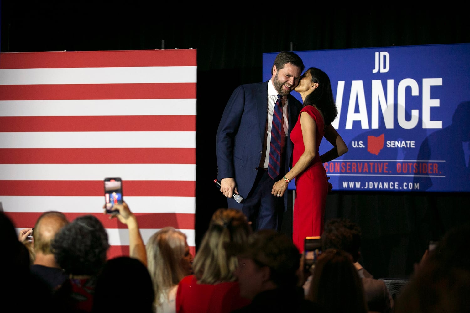 J.D. Vance is joined onstage by his wife, Usha Vance, as he speaks to supporters in Cincinnati after winning the Republican Ohio Senate primary on Tuesday night, May 3, 2021. (Maddie McGarvey/The New York Times)