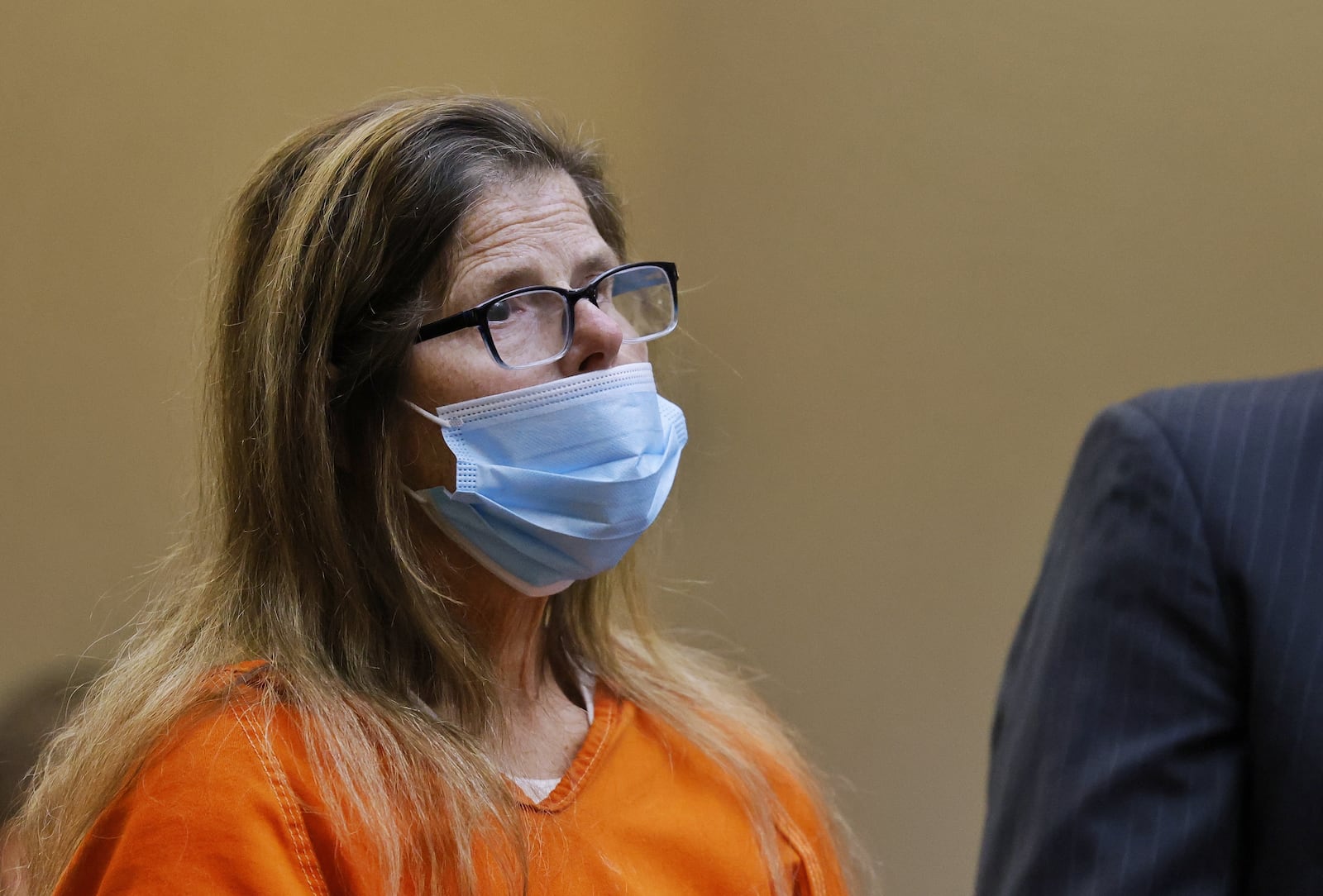 Nancy C. Imfeld, 64, was indicted for felonious assault in the shooting of her husband, Douglas, at their home in Monroe in December. Imfeld appeared for a hearing in Butler County Common Pleas Court Thursday, Jan. 13, 2022 in Hamilton. NICK GRAHAM / STAFF