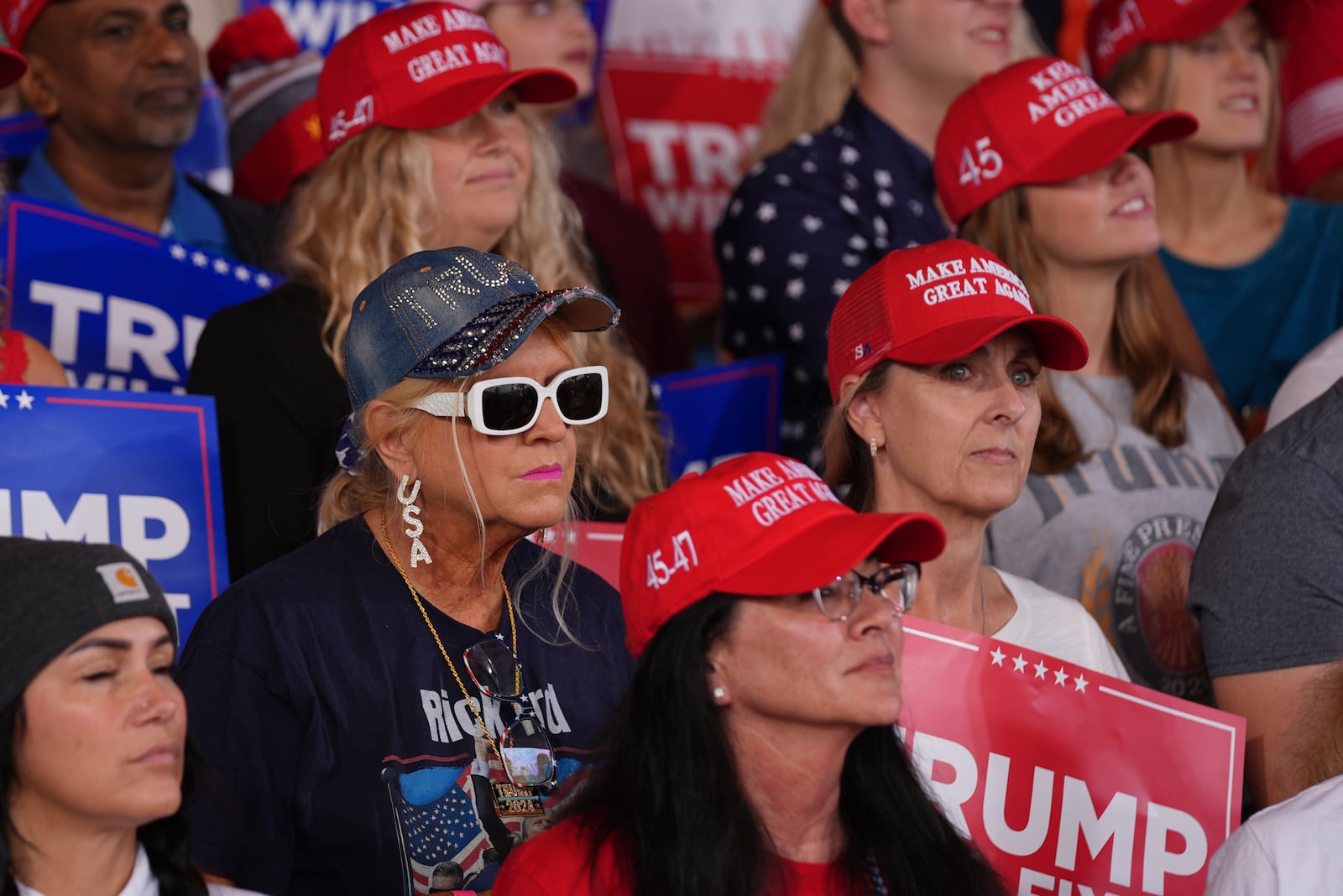 Supporters arrives before Republican presidential nominee former President Donald Trump speaks at a campaign rally at Gastonia Municipal Airport, Saturday, Nov. 2, 2024, in Gastonia, N.C. (AP Photo/Evan Vucci)