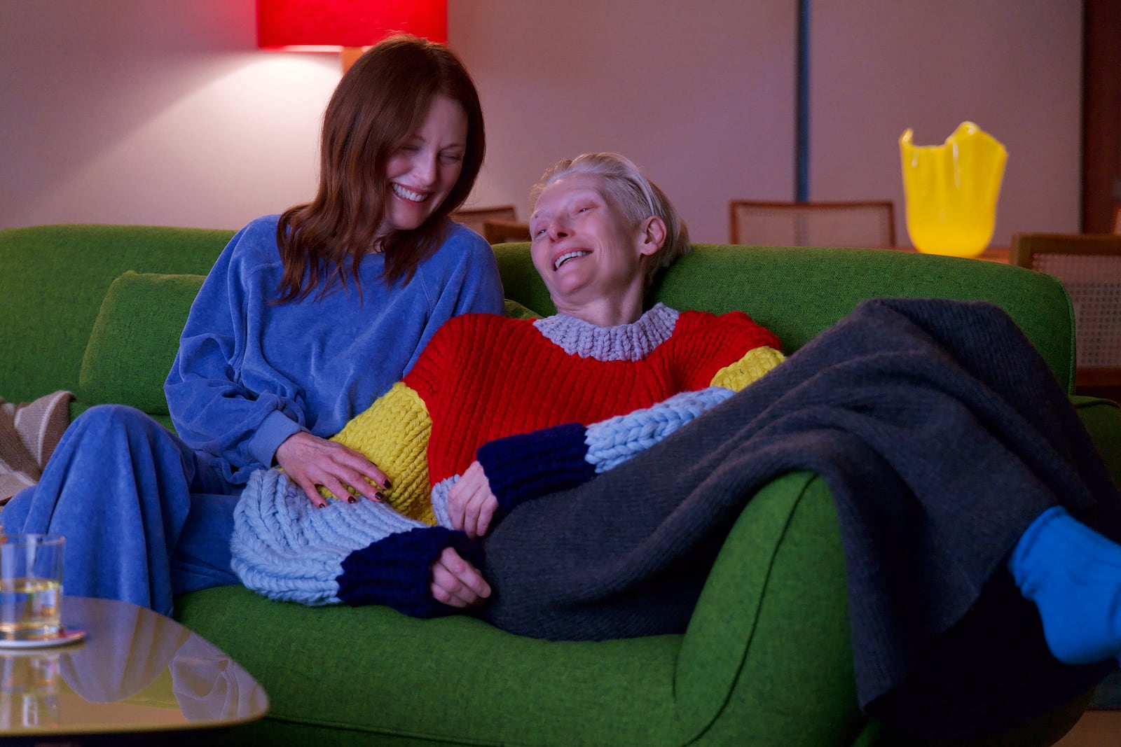 This image released by Sony Pictures Classics shows Julianne Moore, left, and Tilda Swinton in a scene from "The Room Next Door." (Sony Pictures Classics via AP)