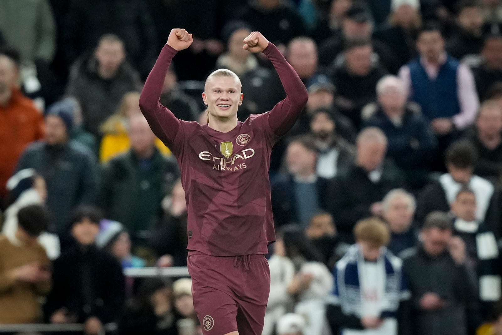 Manchester City's Erling Haaland celebrates after scoring his side's first goal during the English Premier League soccer match between Tottenham Hotspur and Manchester City at Tottenham Hotspur Stadium in London, Wednesday, Feb. 26, 2025. (AP Photo/Frank Augstein)