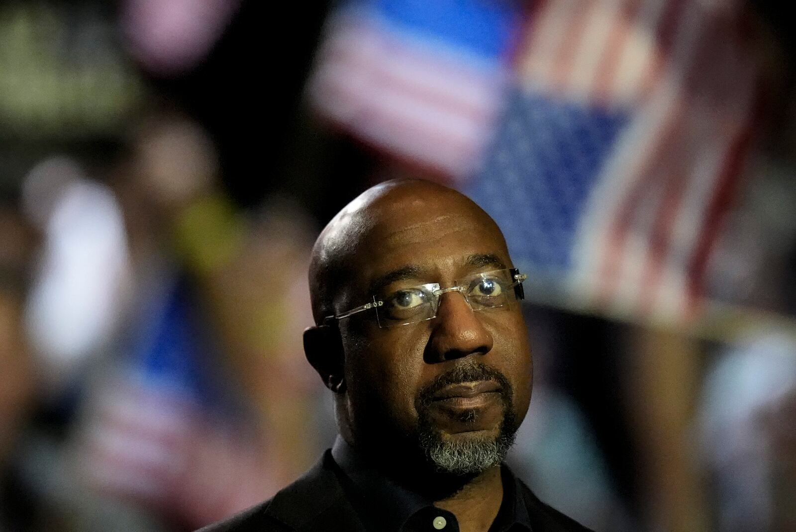 U.S. Sen. Raphael Warnock, D-Ga., attends a Rally for our Republic gathering, Saturday, March 22, 2025, in Atlanta. (AP Photo/Mike Stewart)