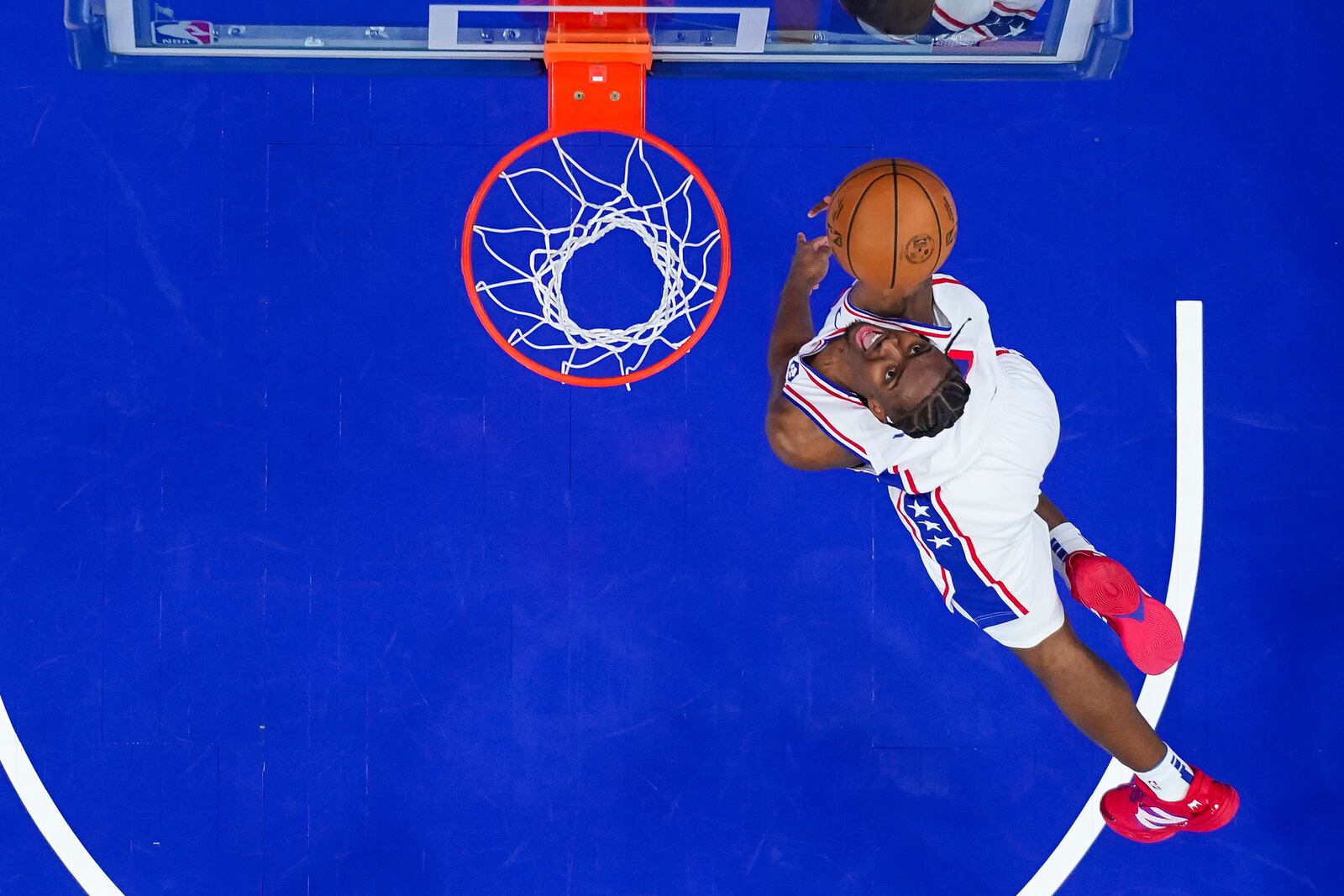 Philadelphia 76ers' Tyrese Maxey goes up to shoot during the first half of an NBA basketball game against the Boston Celtics, Sunday, Feb. 2, 2025, in Philadelphia. (AP Photo/Chris Szagola)