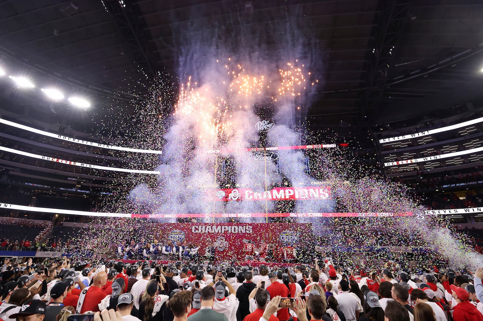 People celebrate after Ohio State defeated Texas in the Cotton Bowl College Football Playoff semifinal game, Friday, Jan. 10, 2025, in Arlington, Texas. (AP Photo/Gareth Patterson)