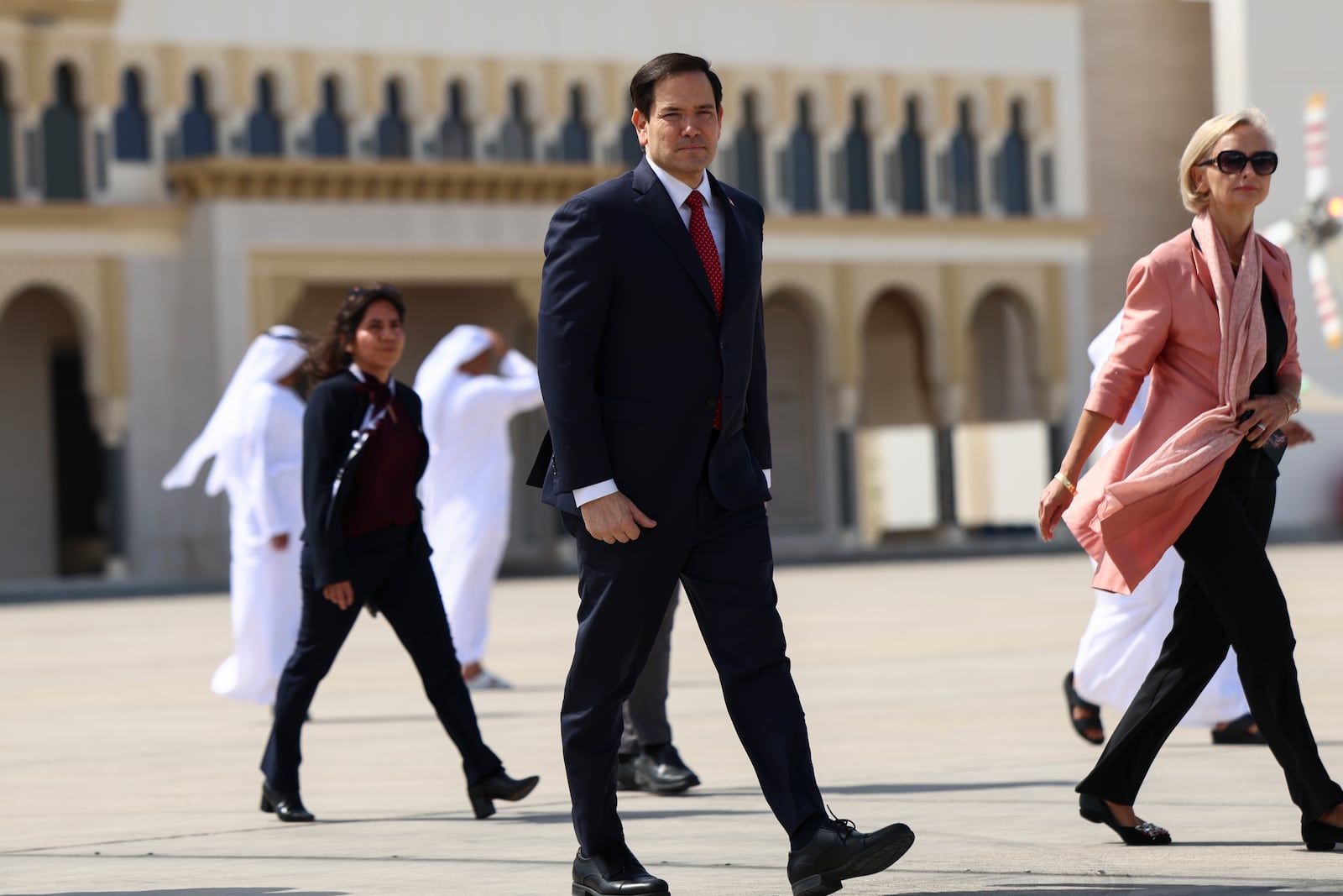 U.S. Secretary of State Marco Rubio walks as he prepares to board an aircraft to depart to the U.S., in Abu Dhabi, United Arab Emirates, Wednesday, Feb. 19, 2025. (Evelyn Hockstein/Pool Photo via AP)