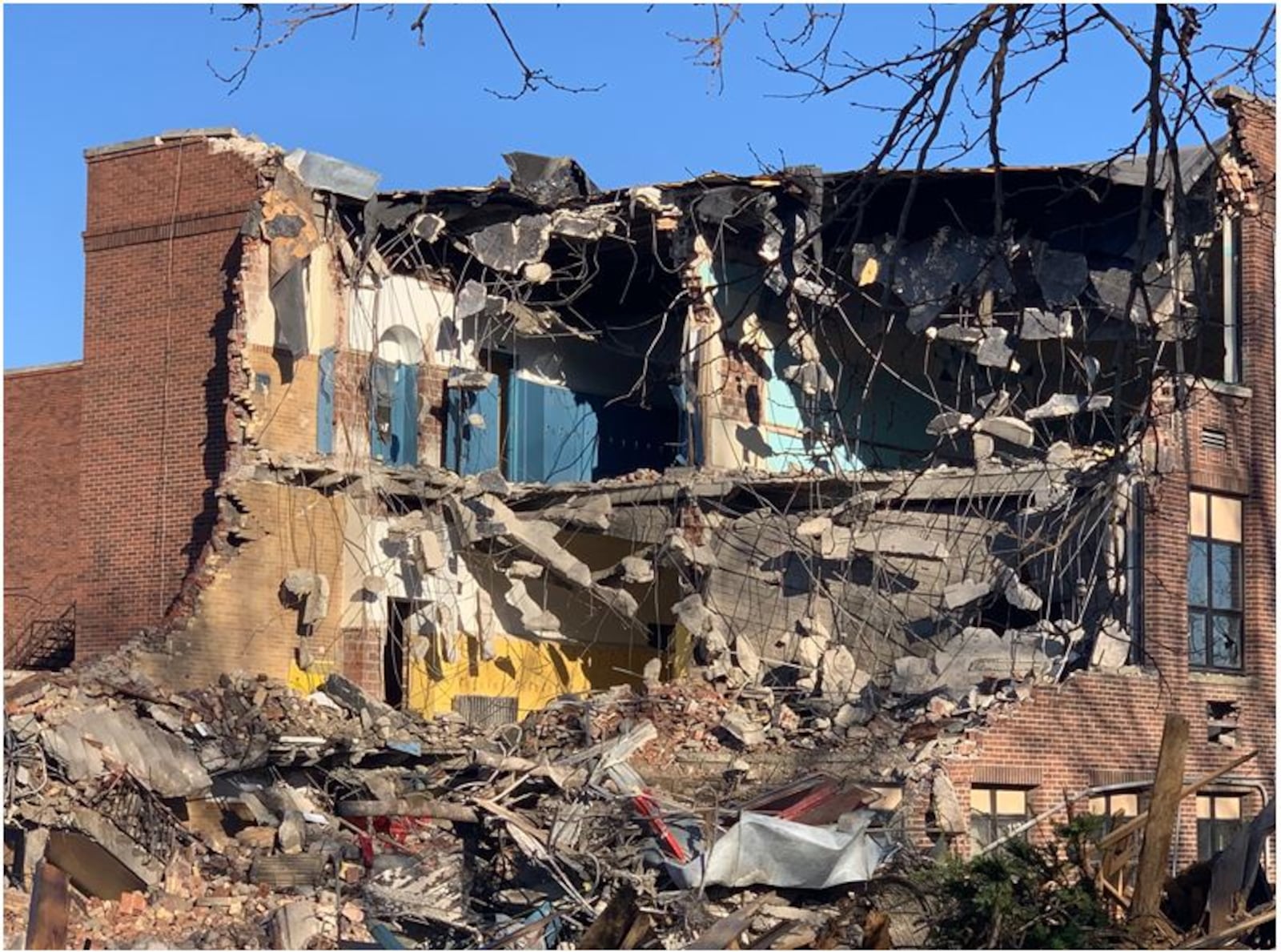 A crew from Green City Demolition works at demolishing the southeast corner of Franklin Junior High School on Wednesday. The 100-year-old building is being torn down to make way for the new Franklin High School campus. The demolition is expected to be completed by early January. ED RICHTER/STAFF