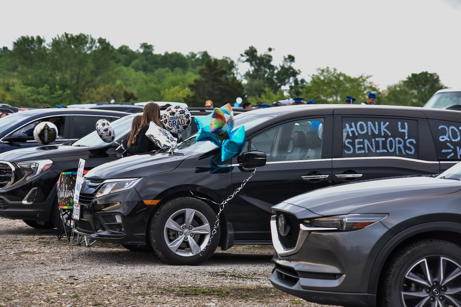 Hamilton High School seniors celebrate graduation at Holiday Auto Theatre drive-in