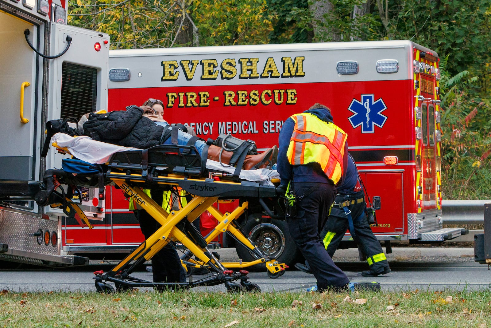 Medics attended to injured alongr Rt. 130. Train accident Mansfield Twp, NJ, New Jersey Transit Light Rail, accident, Monday, Oct. 14, 2024. (Alejandro A. Alvarez/The Philadelphia Inquirer via AP)